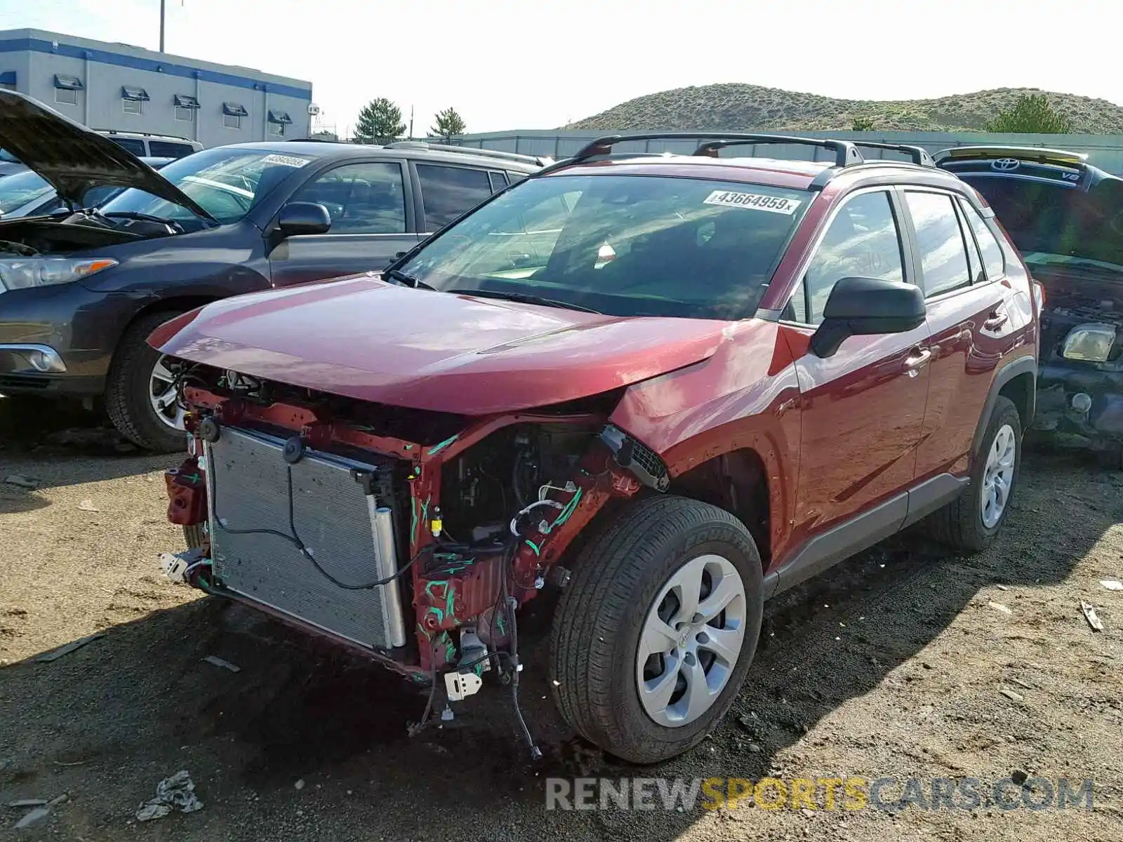 2 Photograph of a damaged car JTMF1RFVXKD014594 TOYOTA RAV4 LE 2019