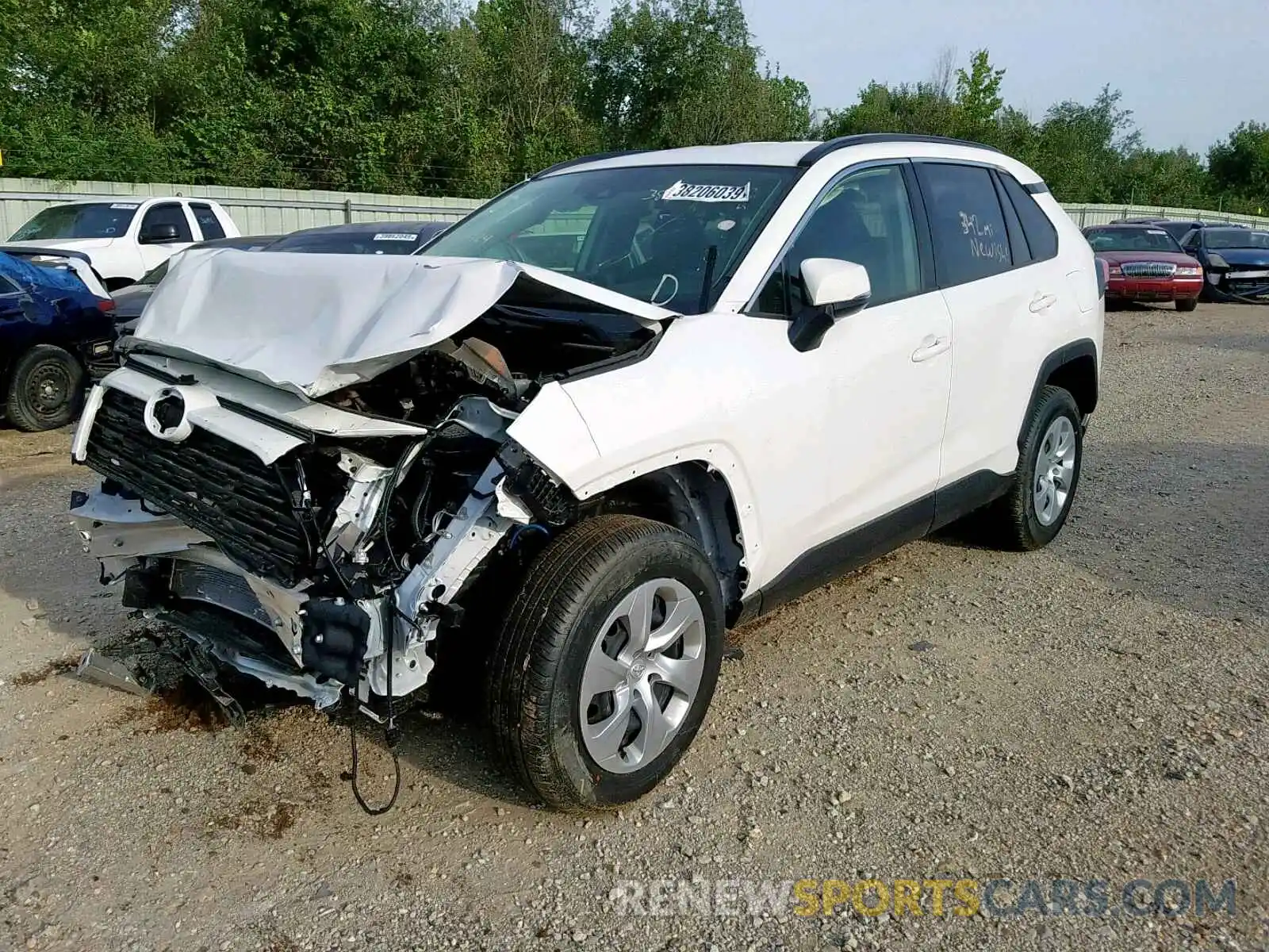 2 Photograph of a damaged car JTMG1RFV0KJ012424 TOYOTA RAV4 LE 2019