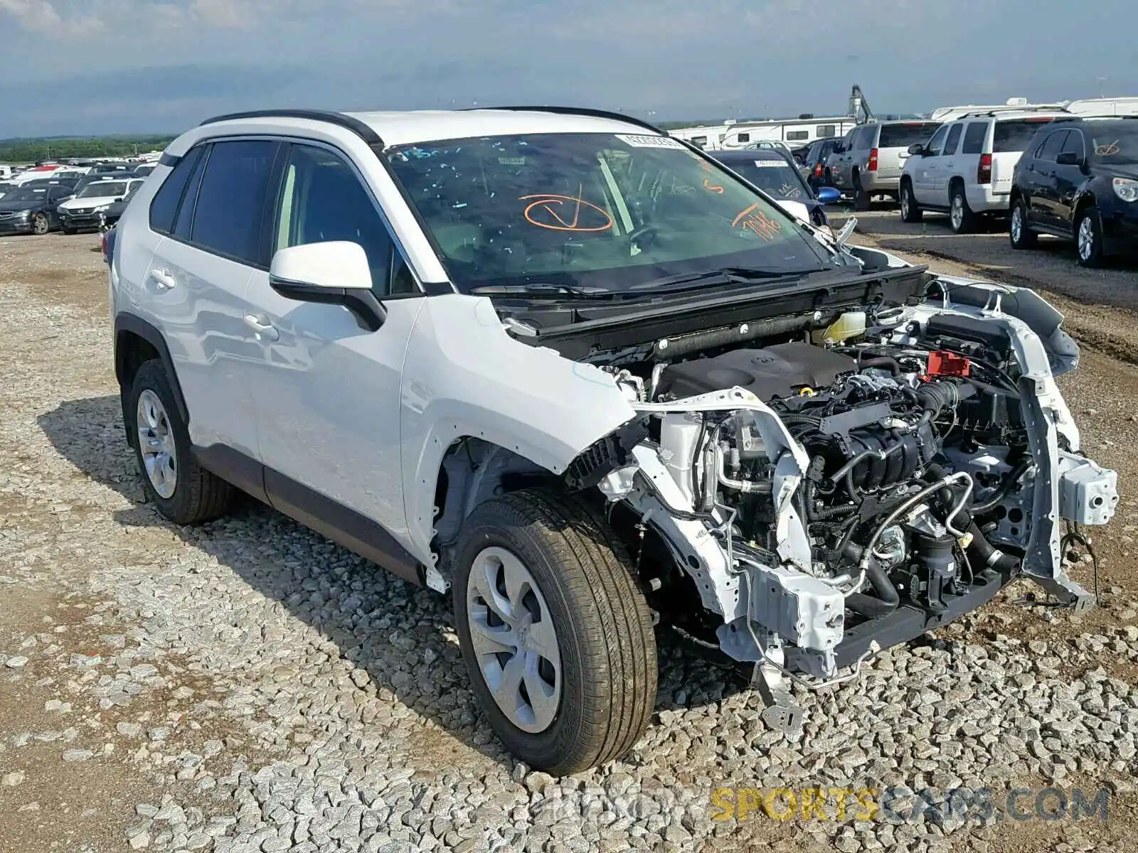 1 Photograph of a damaged car JTMG1RFV2KJ007046 TOYOTA RAV4 LE 2019