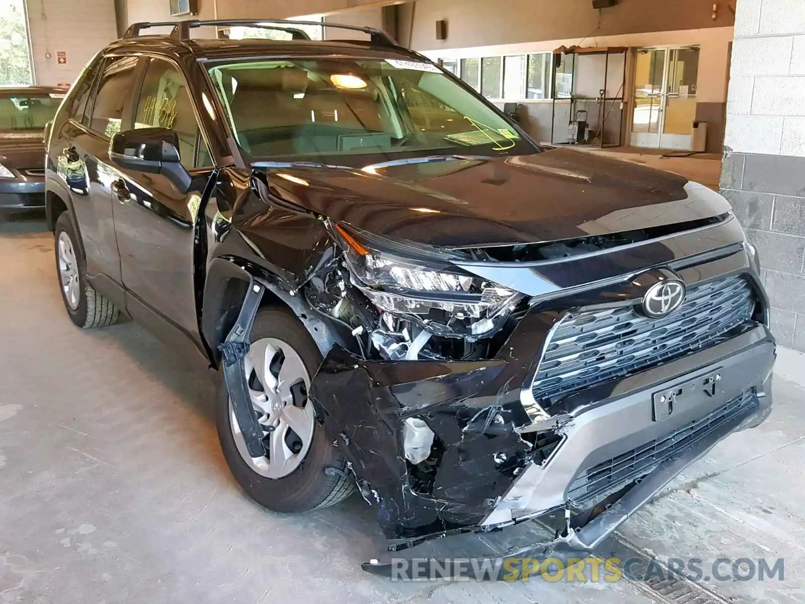 1 Photograph of a damaged car JTMG1RFV7KD003704 TOYOTA RAV4 LE 2019