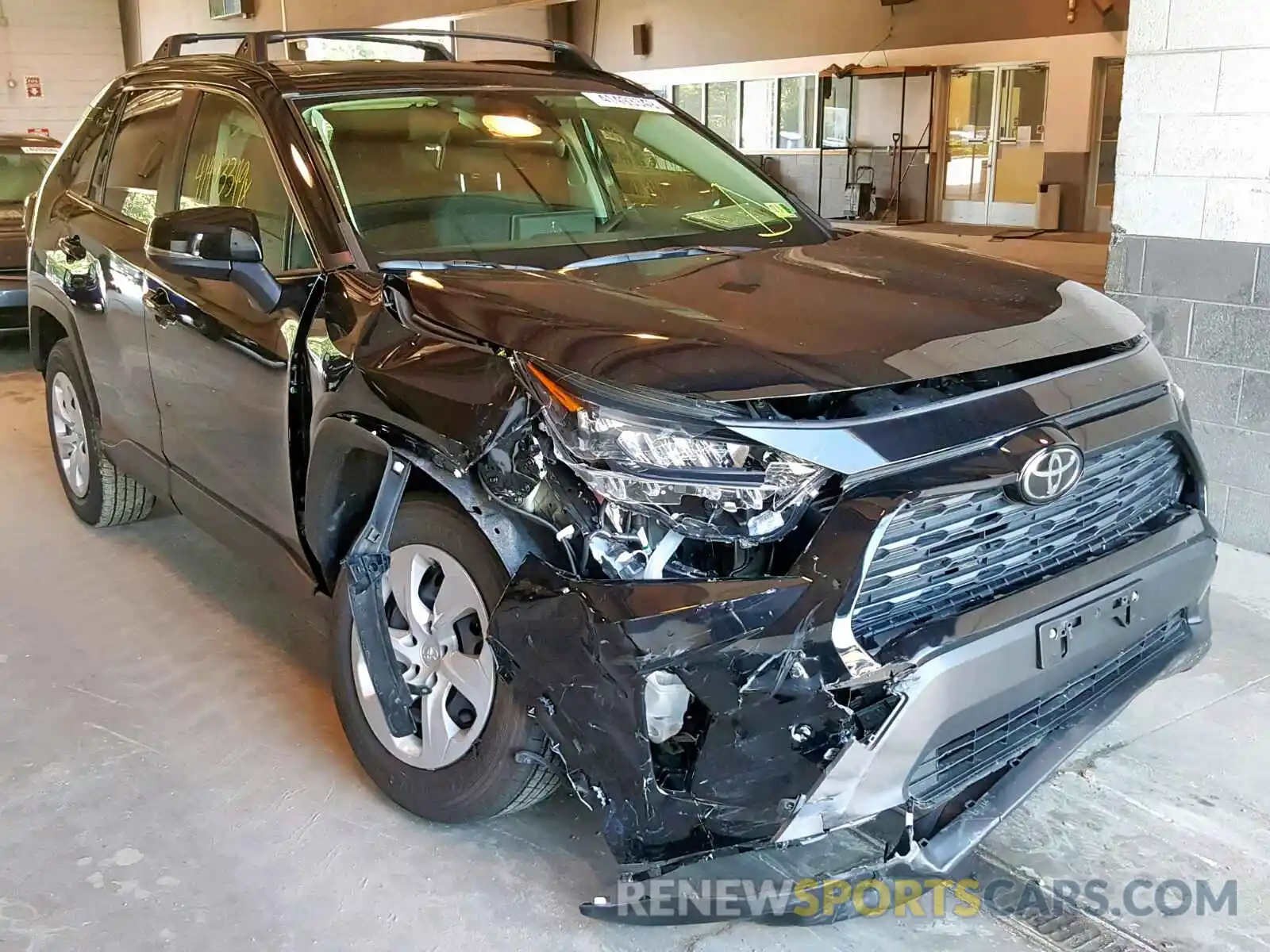 9 Photograph of a damaged car JTMG1RFV7KD003704 TOYOTA RAV4 LE 2019