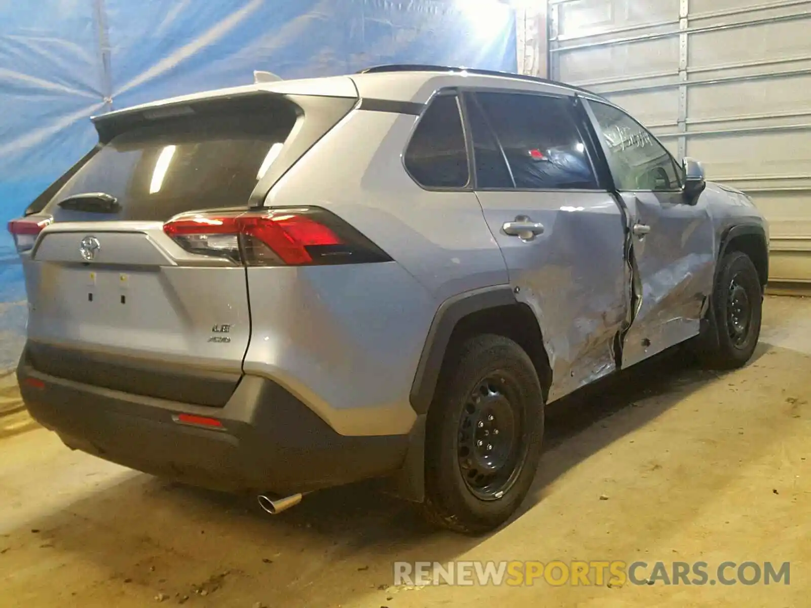 4 Photograph of a damaged car JTMG1RFV8KD012024 TOYOTA RAV4 LE 2019