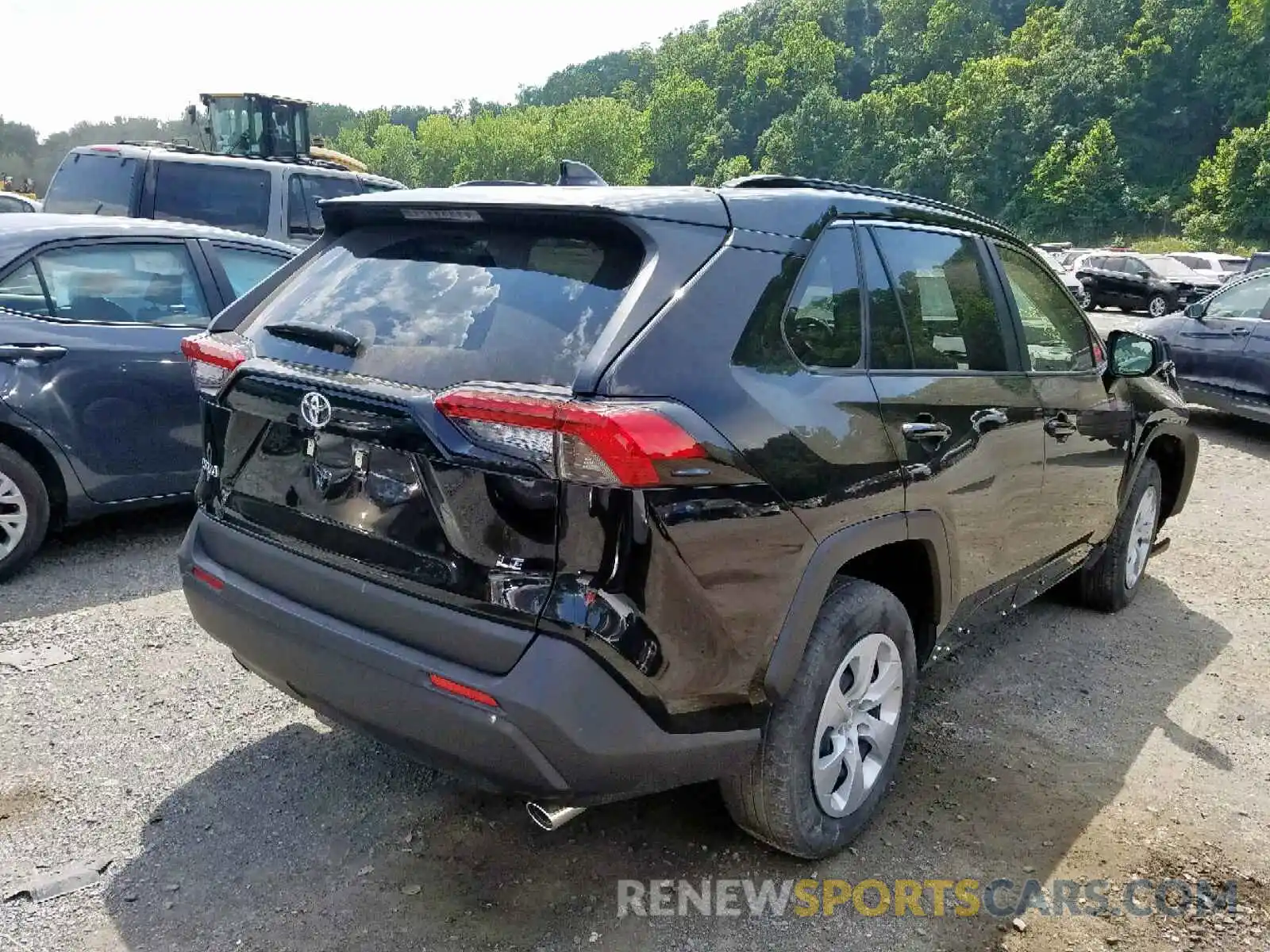 4 Photograph of a damaged car JTMH1RFV0KD500761 TOYOTA RAV4 LE 2019