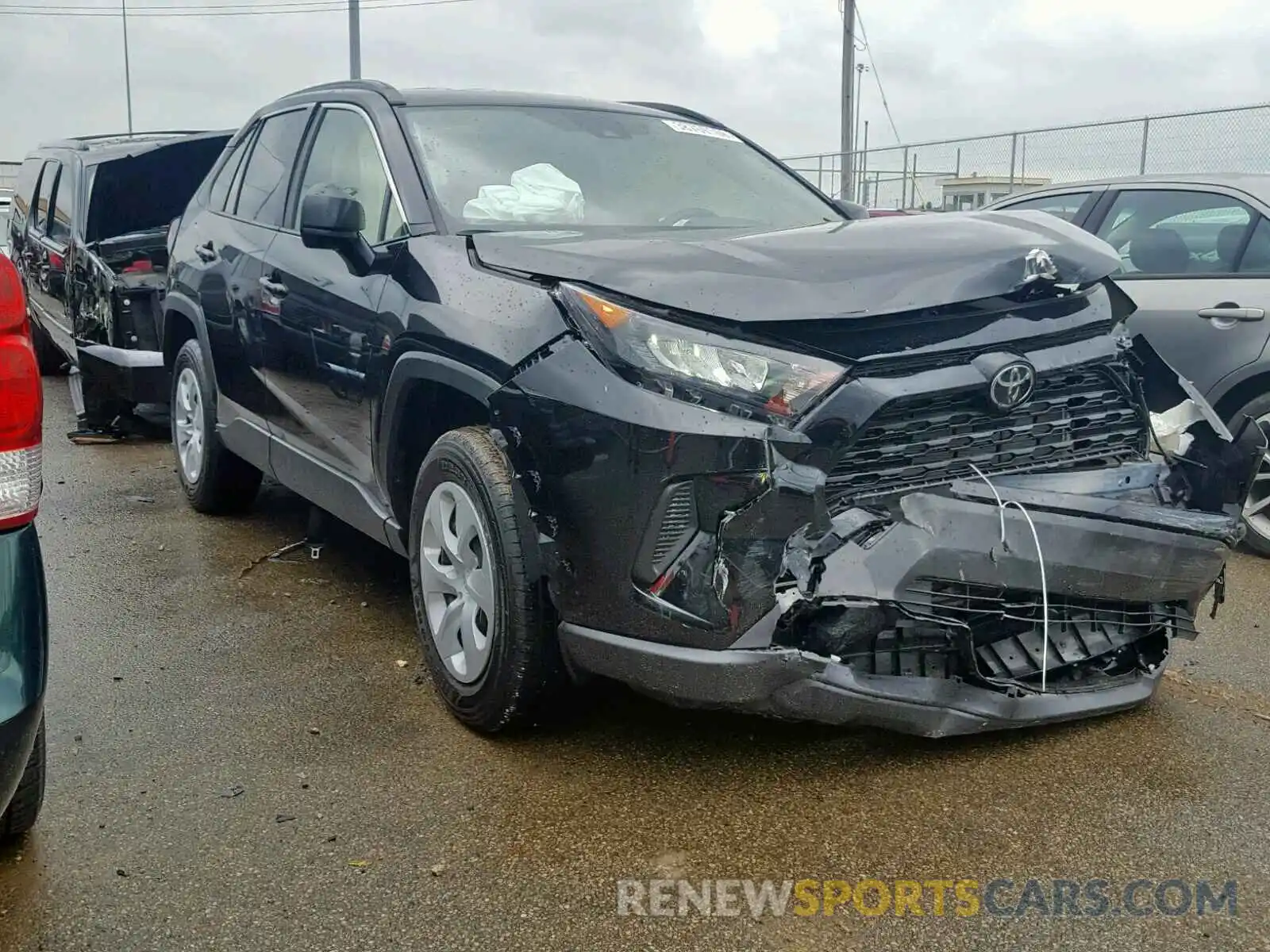1 Photograph of a damaged car JTMH1RFV0KJ009155 TOYOTA RAV4 LE 2019