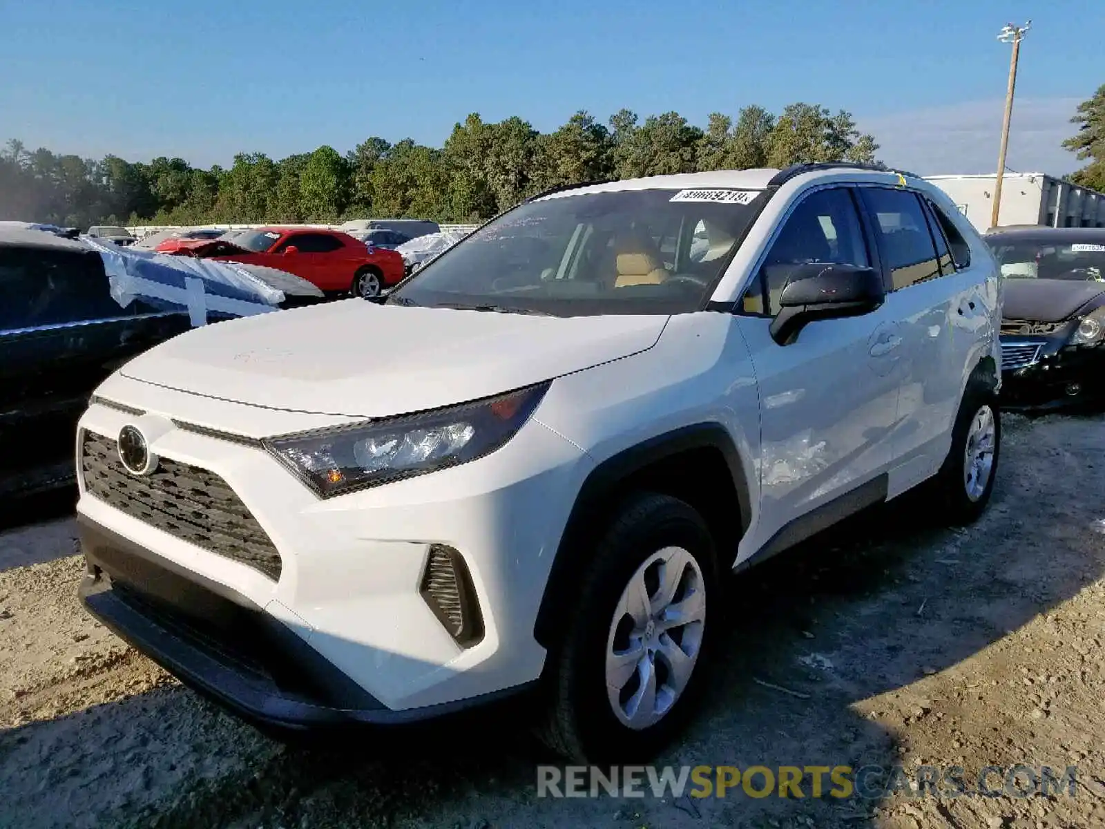 2 Photograph of a damaged car JTMH1RFV0KJ011116 TOYOTA RAV4 LE 2019