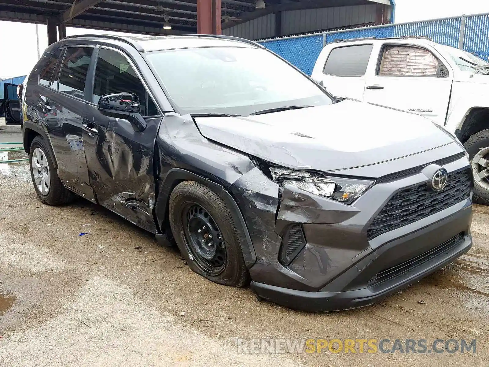 1 Photograph of a damaged car JTMH1RFV0KJ011276 TOYOTA RAV4 LE 2019