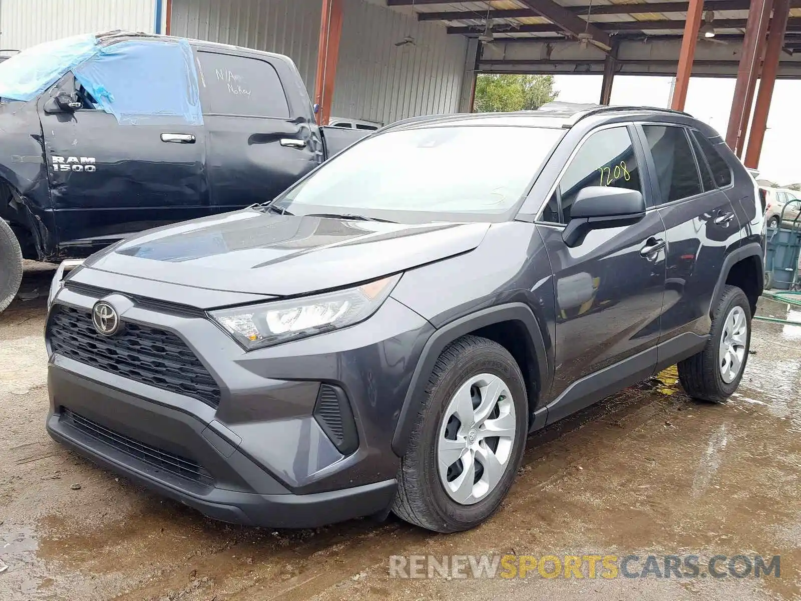 2 Photograph of a damaged car JTMH1RFV0KJ011276 TOYOTA RAV4 LE 2019