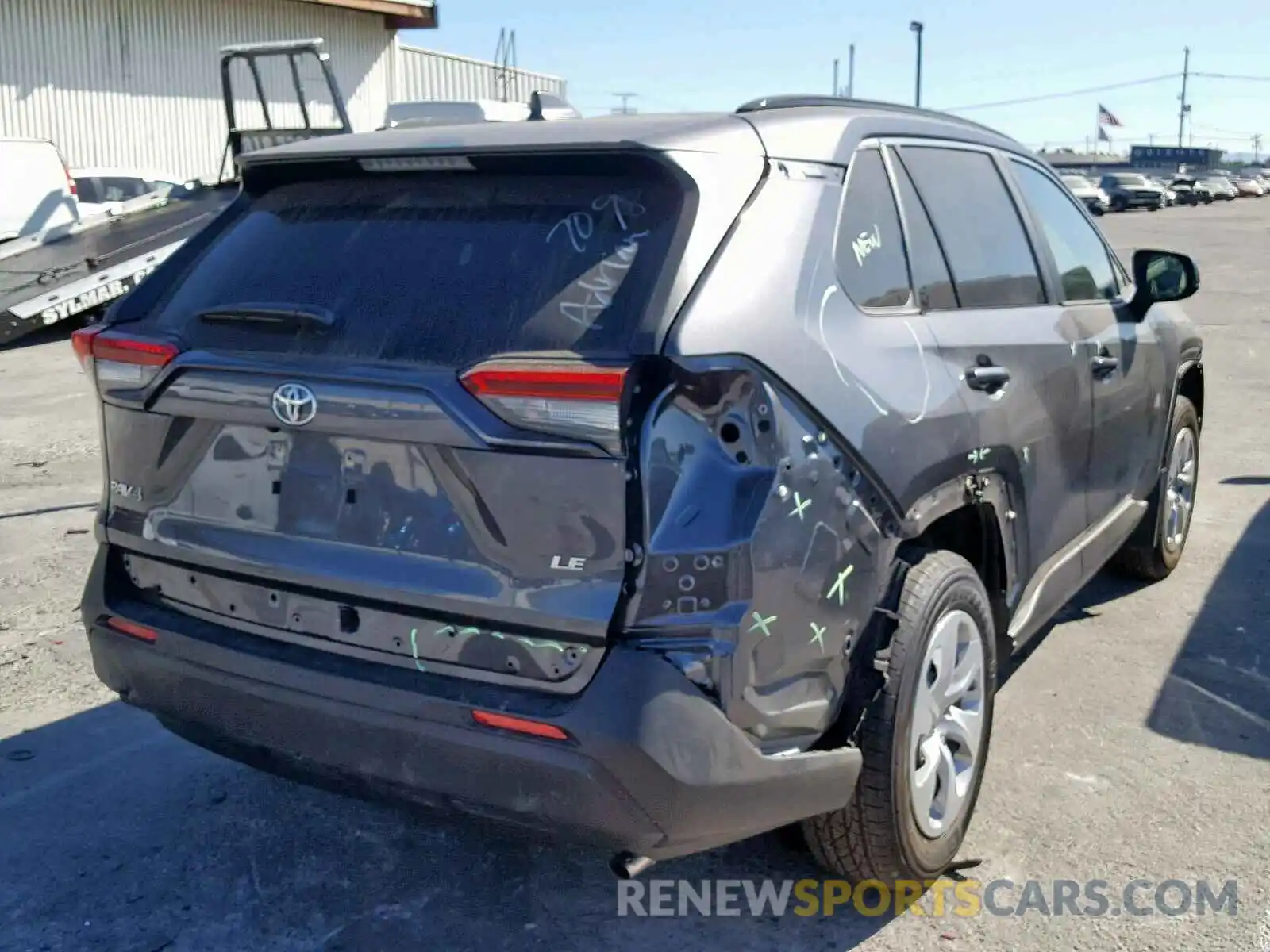 4 Photograph of a damaged car JTMH1RFV1KD503507 TOYOTA RAV4 LE 2019