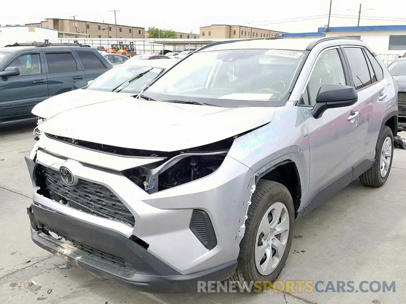 2 Photograph of a damaged car JTMH1RFV1KD504592 TOYOTA RAV4 LE 2019