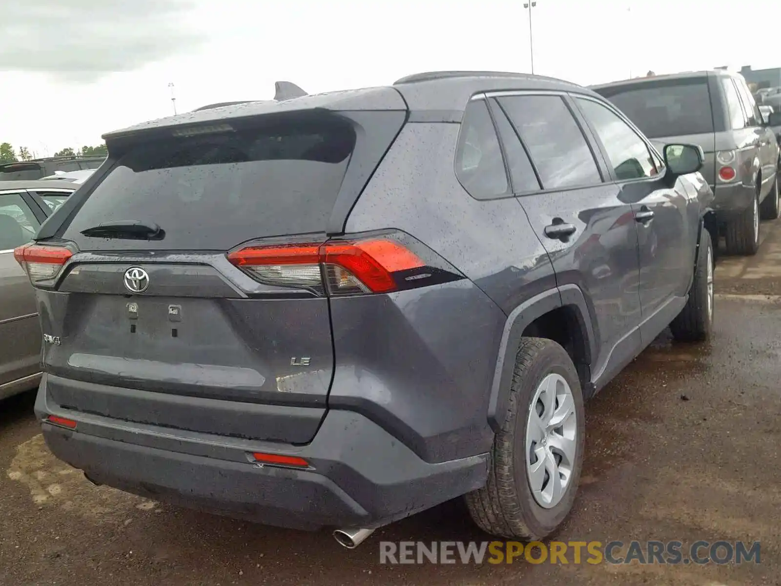 4 Photograph of a damaged car JTMH1RFV1KD510179 TOYOTA RAV4 LE 2019