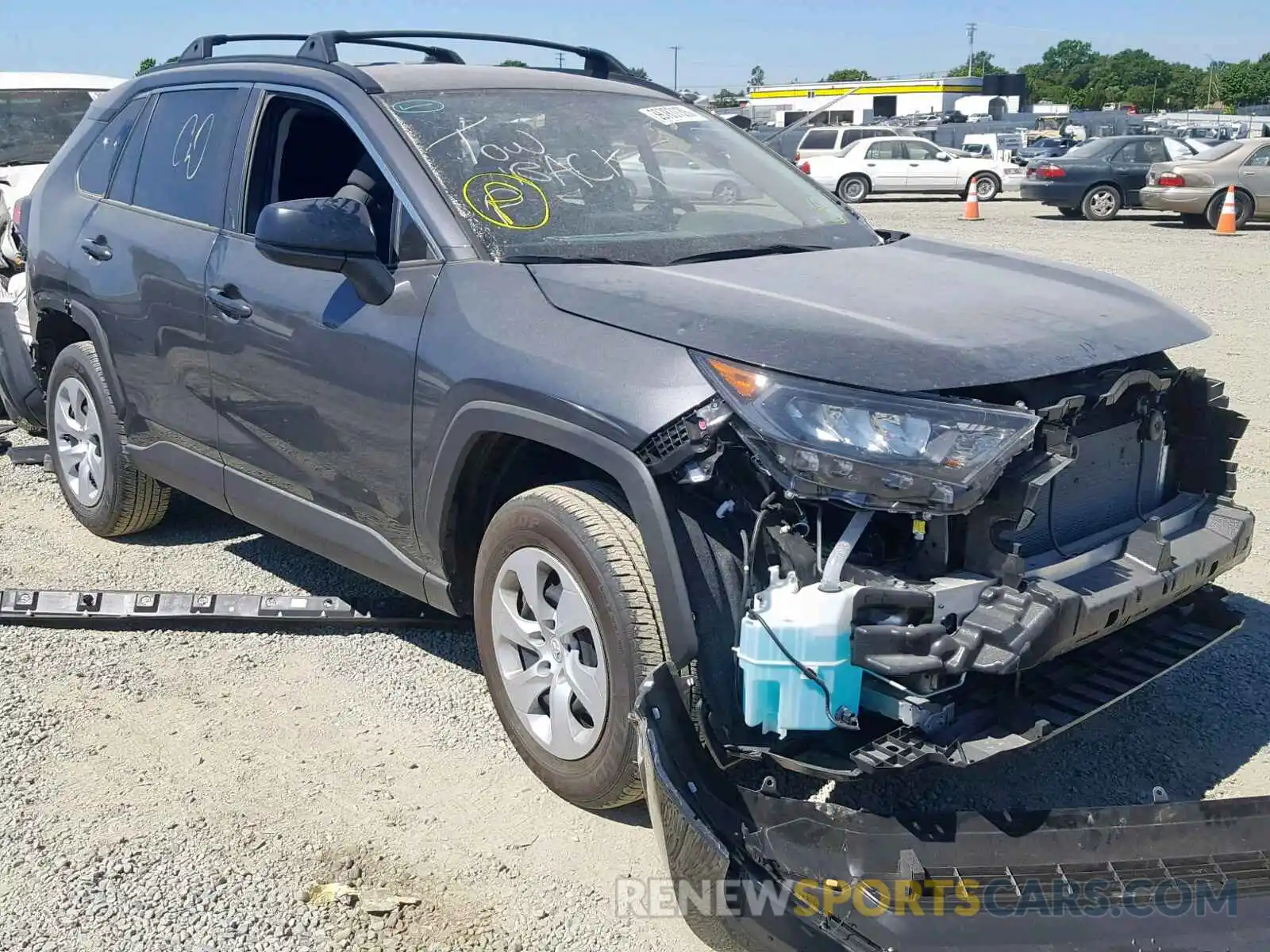 1 Photograph of a damaged car JTMH1RFV2KD015246 TOYOTA RAV4 LE 2019