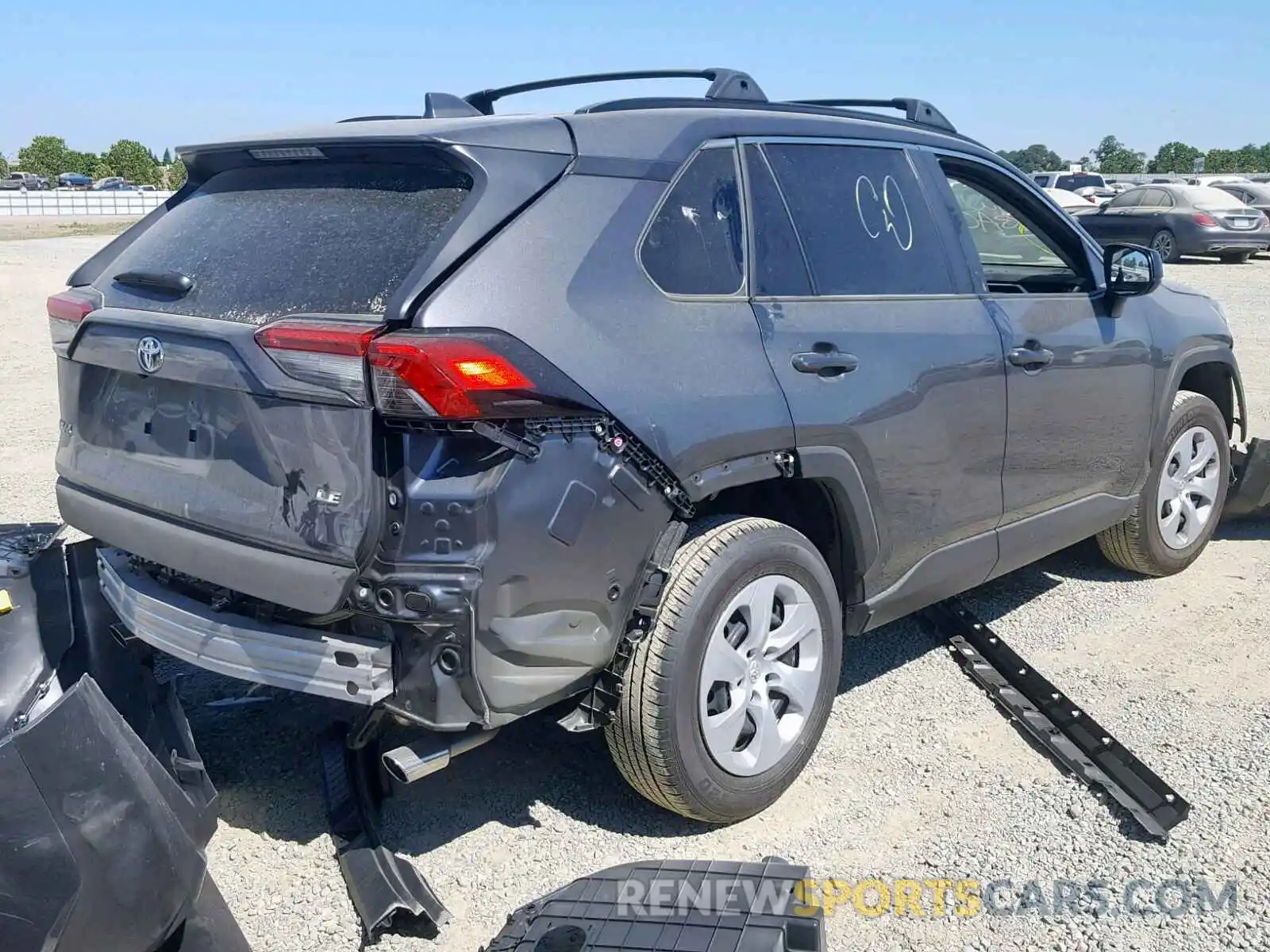 4 Photograph of a damaged car JTMH1RFV2KD015246 TOYOTA RAV4 LE 2019