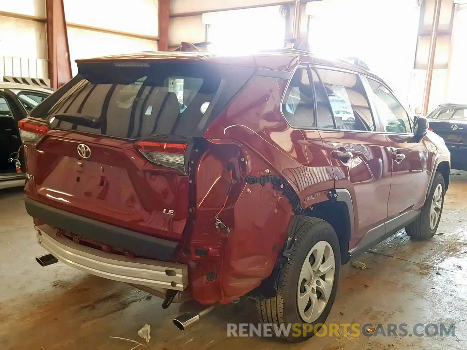 4 Photograph of a damaged car JTMH1RFV2KD018115 TOYOTA RAV4 LE 2019