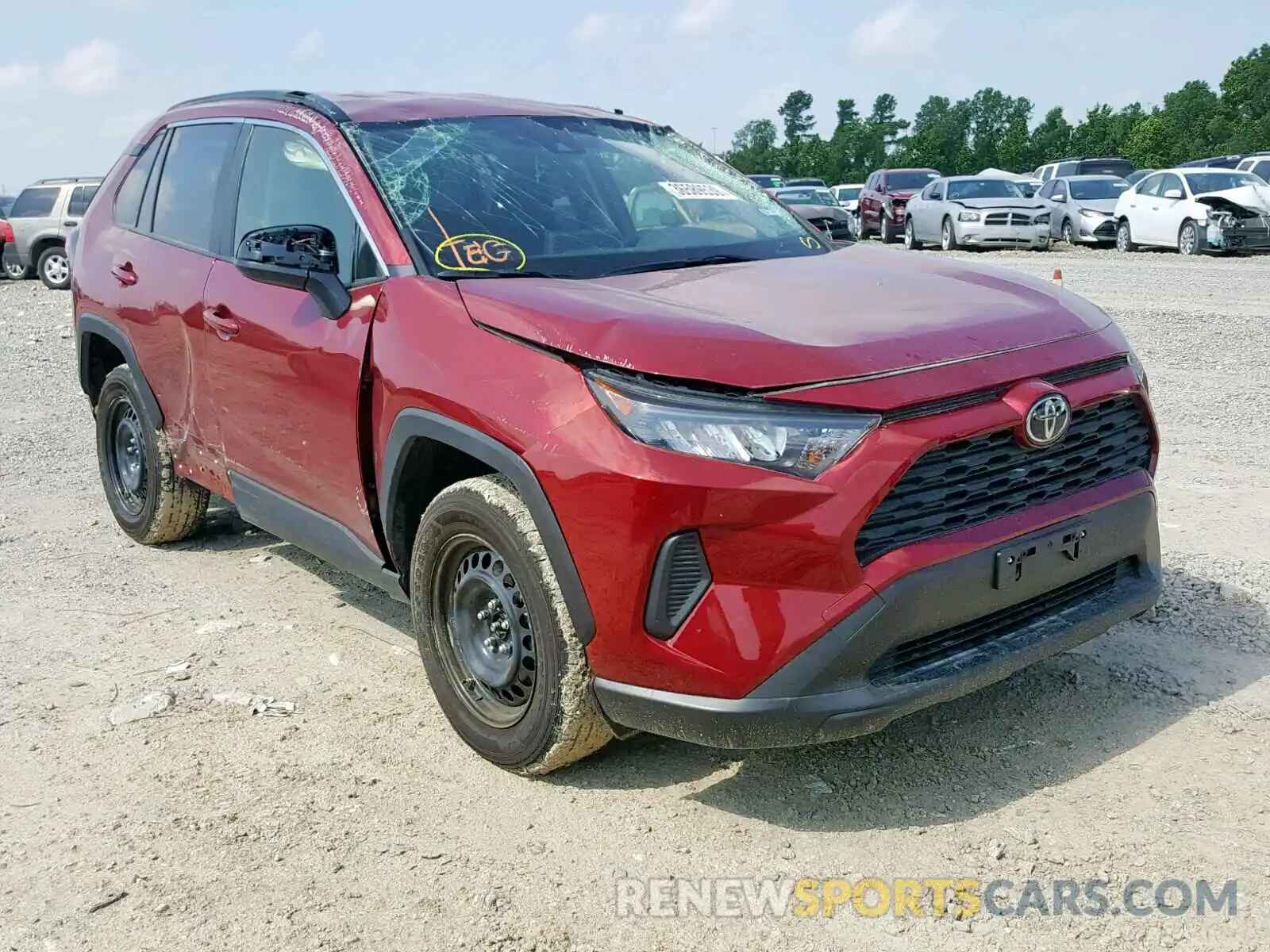 1 Photograph of a damaged car JTMH1RFV2KD502124 TOYOTA RAV4 LE 2019