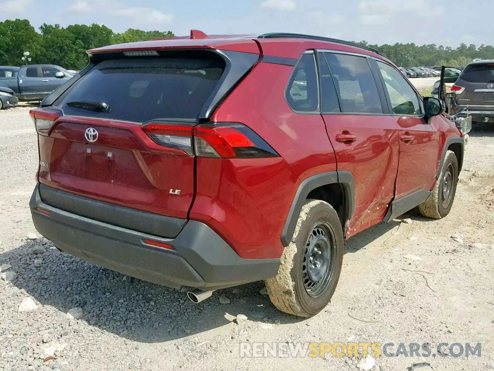 4 Photograph of a damaged car JTMH1RFV2KD502124 TOYOTA RAV4 LE 2019