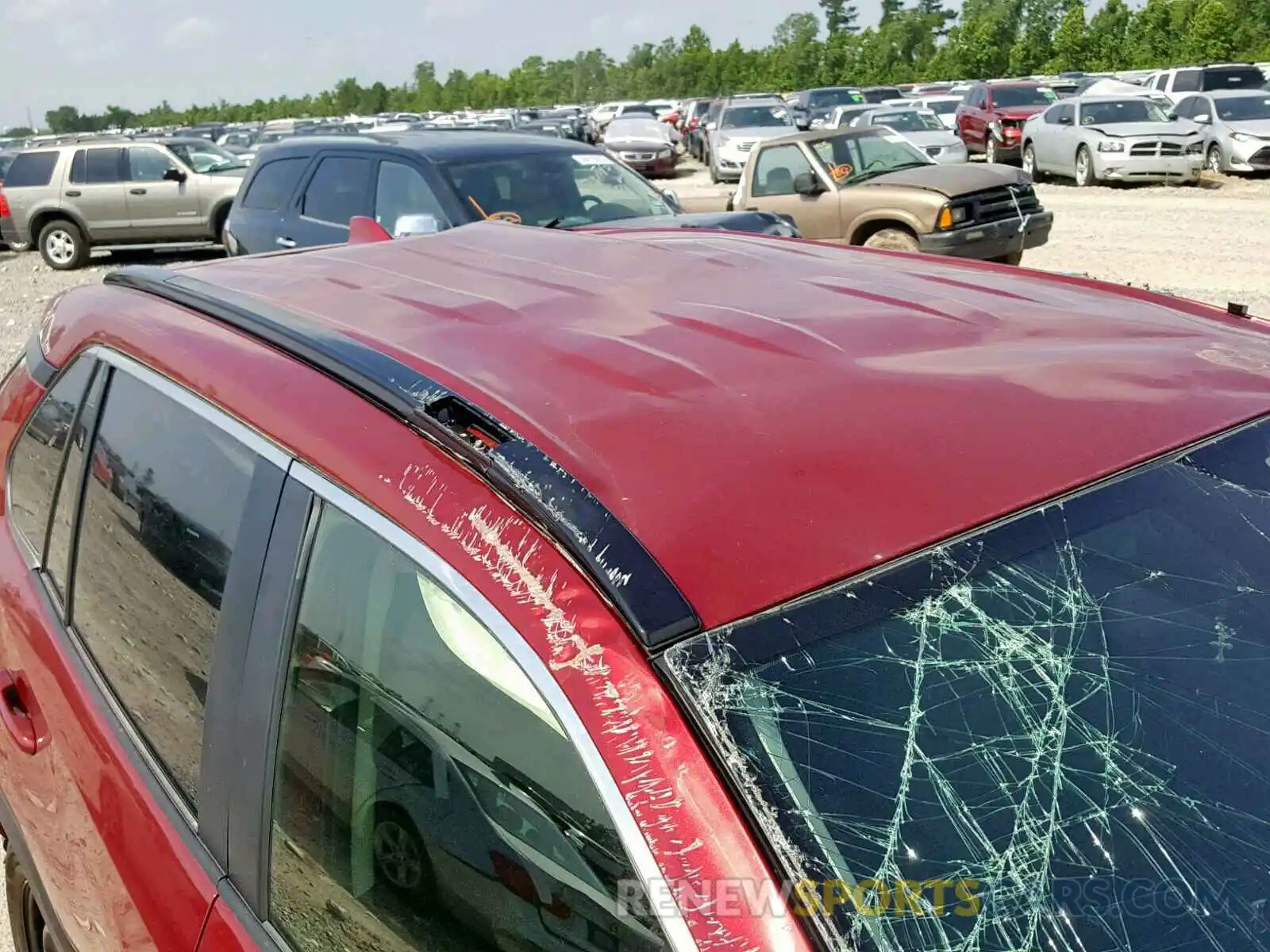 9 Photograph of a damaged car JTMH1RFV2KD502124 TOYOTA RAV4 LE 2019