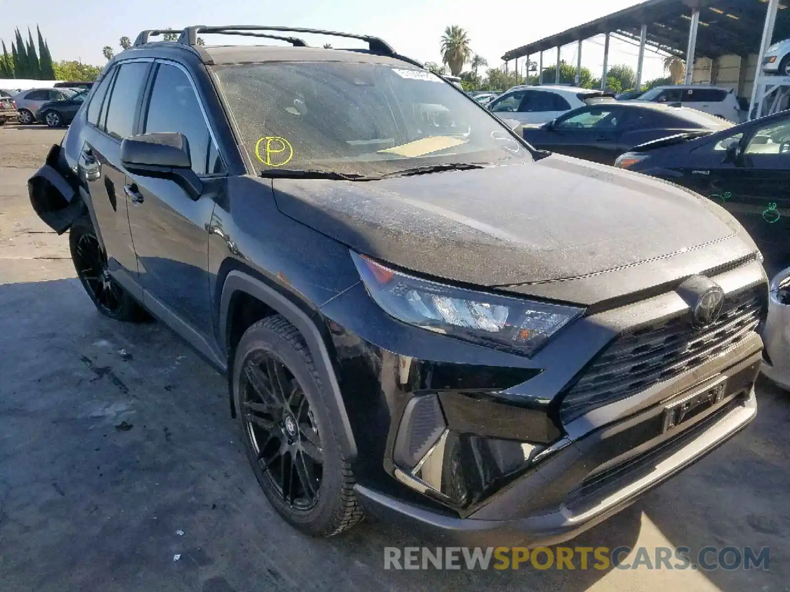 1 Photograph of a damaged car JTMH1RFV2KJ004409 TOYOTA RAV4 LE 2019