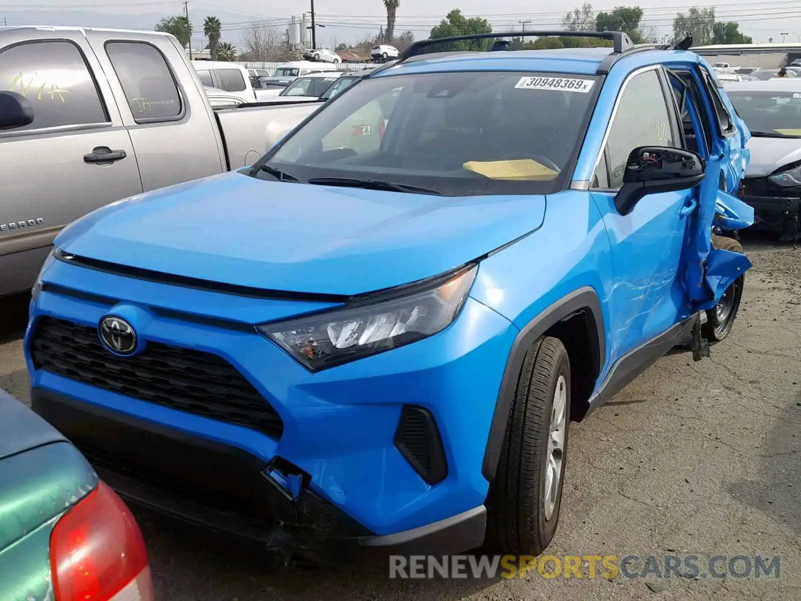 2 Photograph of a damaged car JTMH1RFV2KJ004412 TOYOTA RAV4 LE 2019