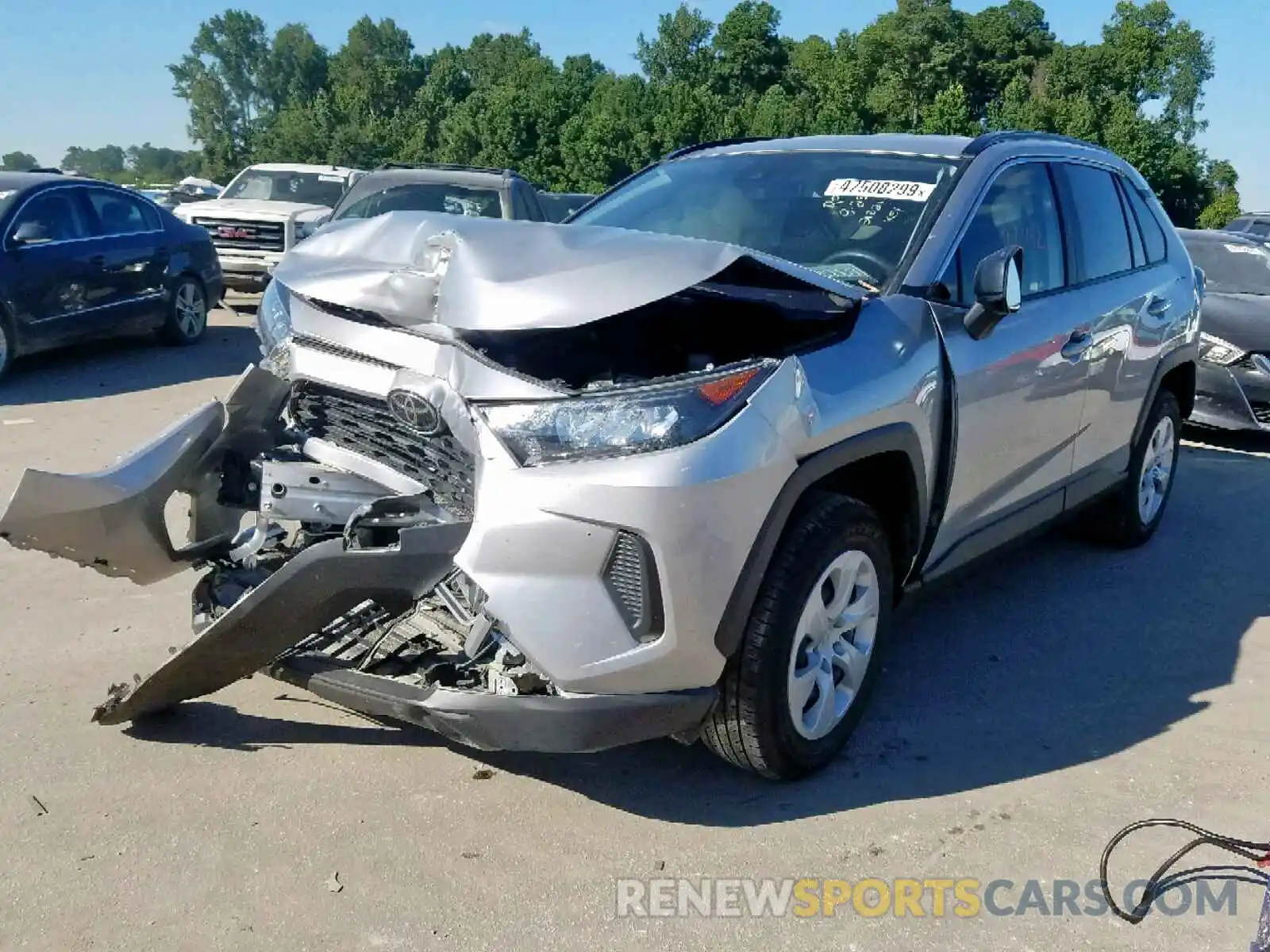 2 Photograph of a damaged car JTMH1RFV3KJ006993 TOYOTA RAV4 LE 2019