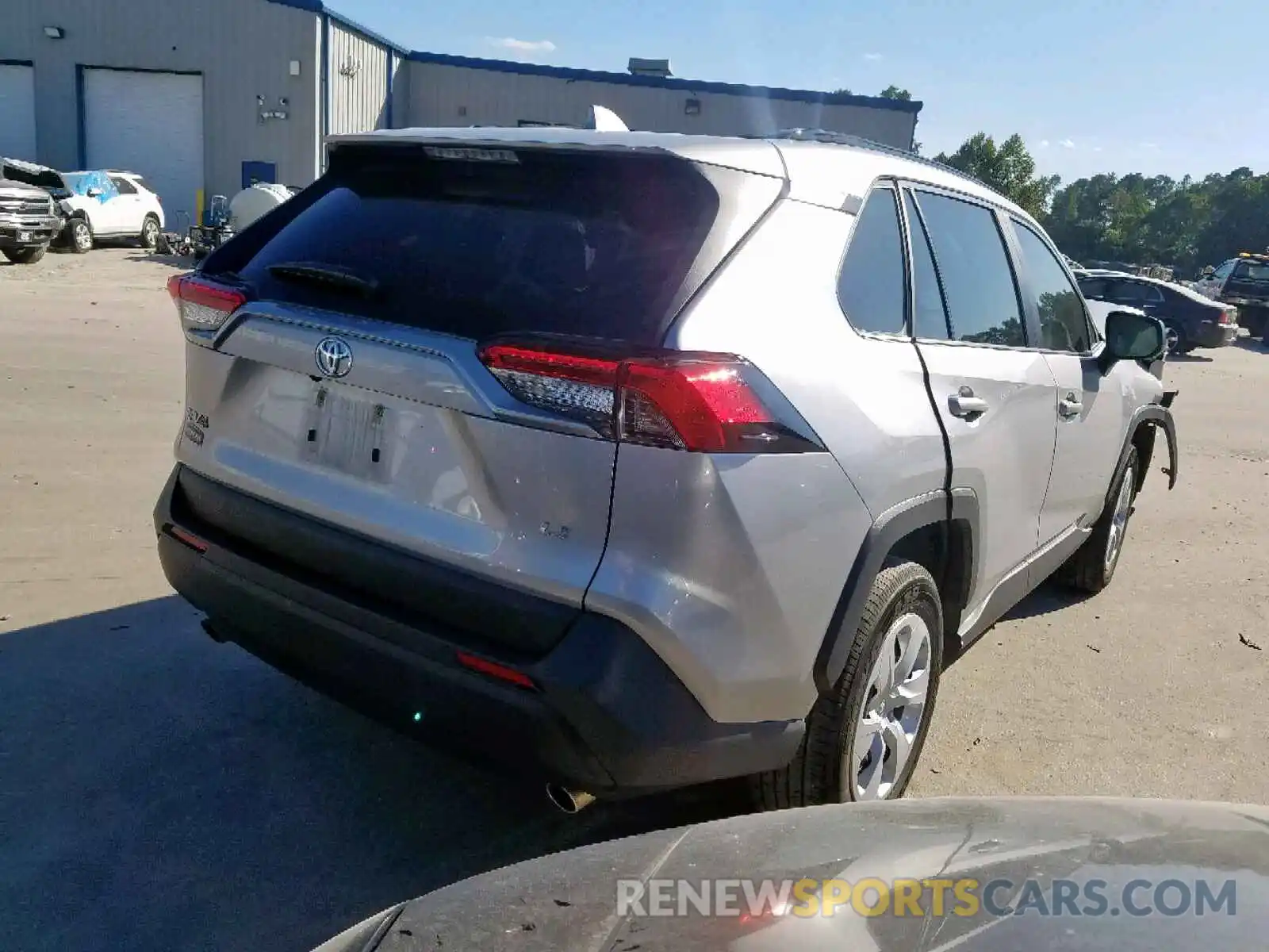 4 Photograph of a damaged car JTMH1RFV3KJ006993 TOYOTA RAV4 LE 2019