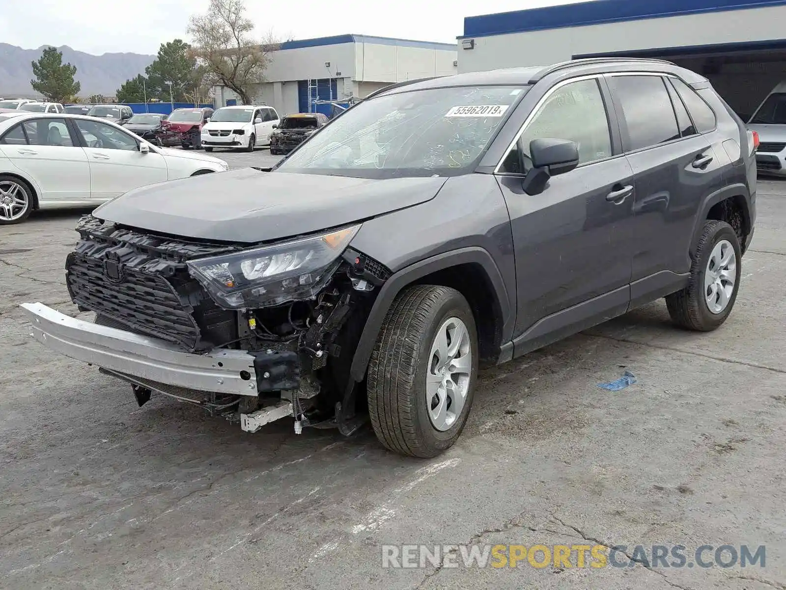 2 Photograph of a damaged car JTMH1RFV5KD505101 TOYOTA RAV4 LE 2019