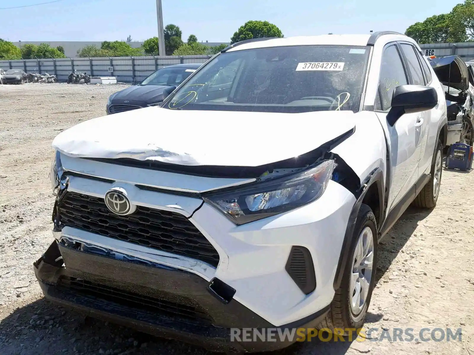 2 Photograph of a damaged car JTMH1RFV5KJ005750 TOYOTA RAV4 LE 2019