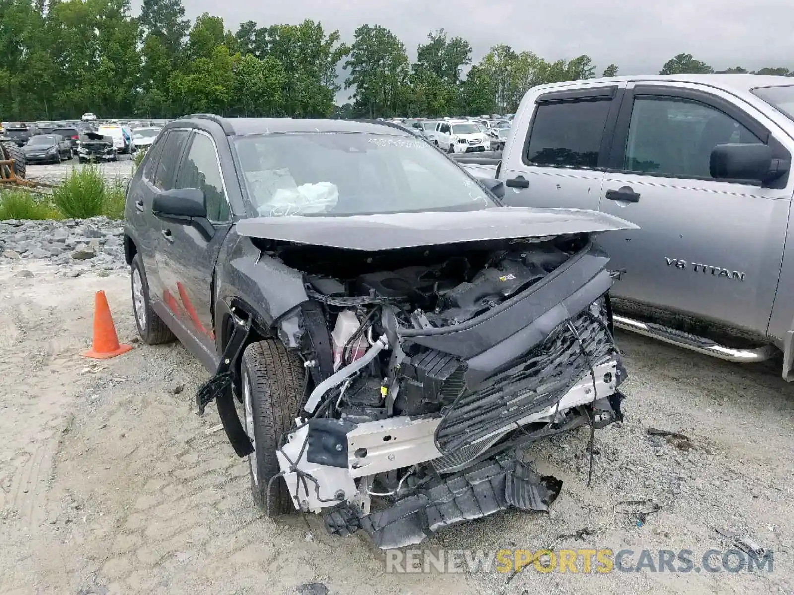 1 Photograph of a damaged car JTMH1RFV5KJ006395 TOYOTA RAV4 LE 2019