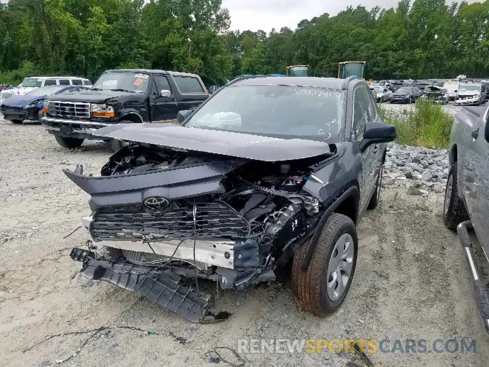 2 Photograph of a damaged car JTMH1RFV5KJ006395 TOYOTA RAV4 LE 2019