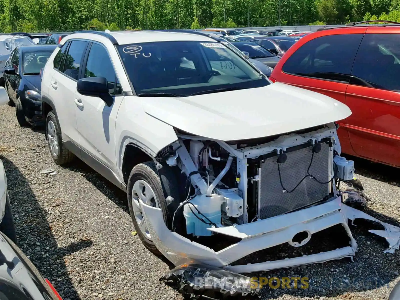 1 Photograph of a damaged car JTMH1RFV5KJ006932 TOYOTA RAV4 LE 2019