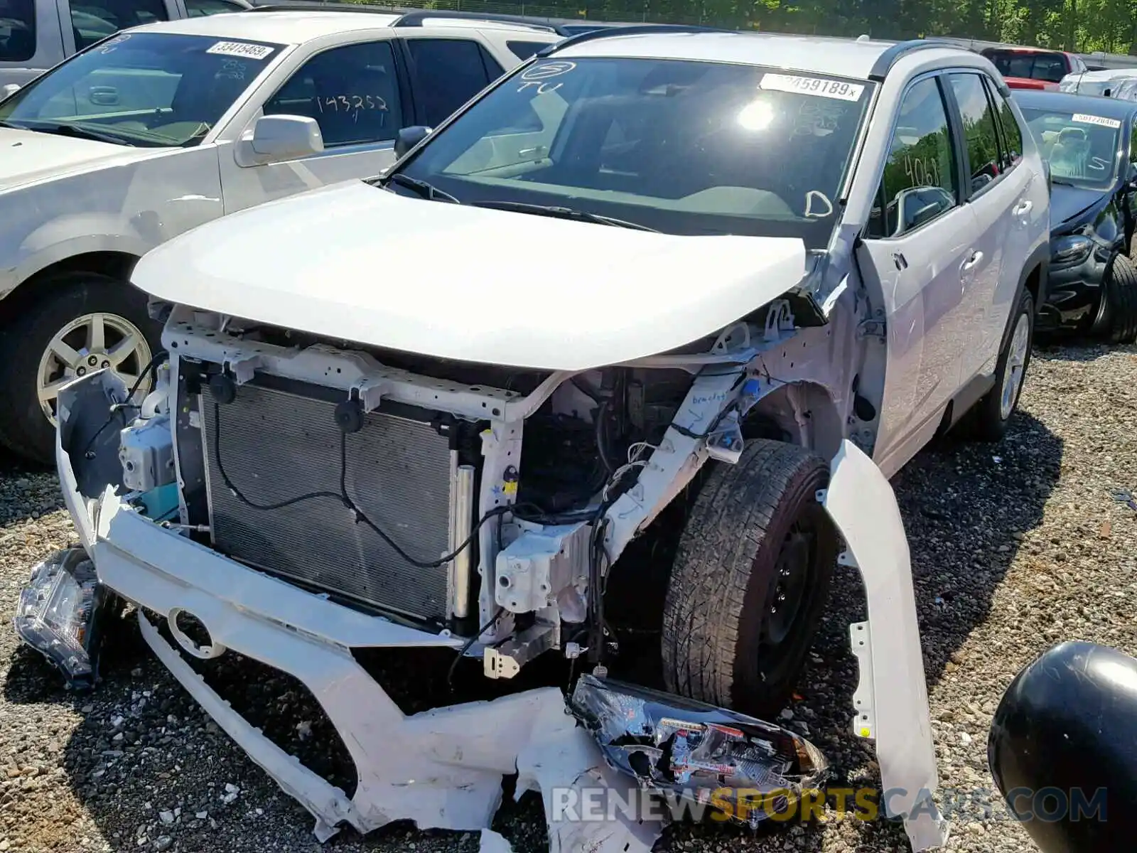 2 Photograph of a damaged car JTMH1RFV5KJ006932 TOYOTA RAV4 LE 2019