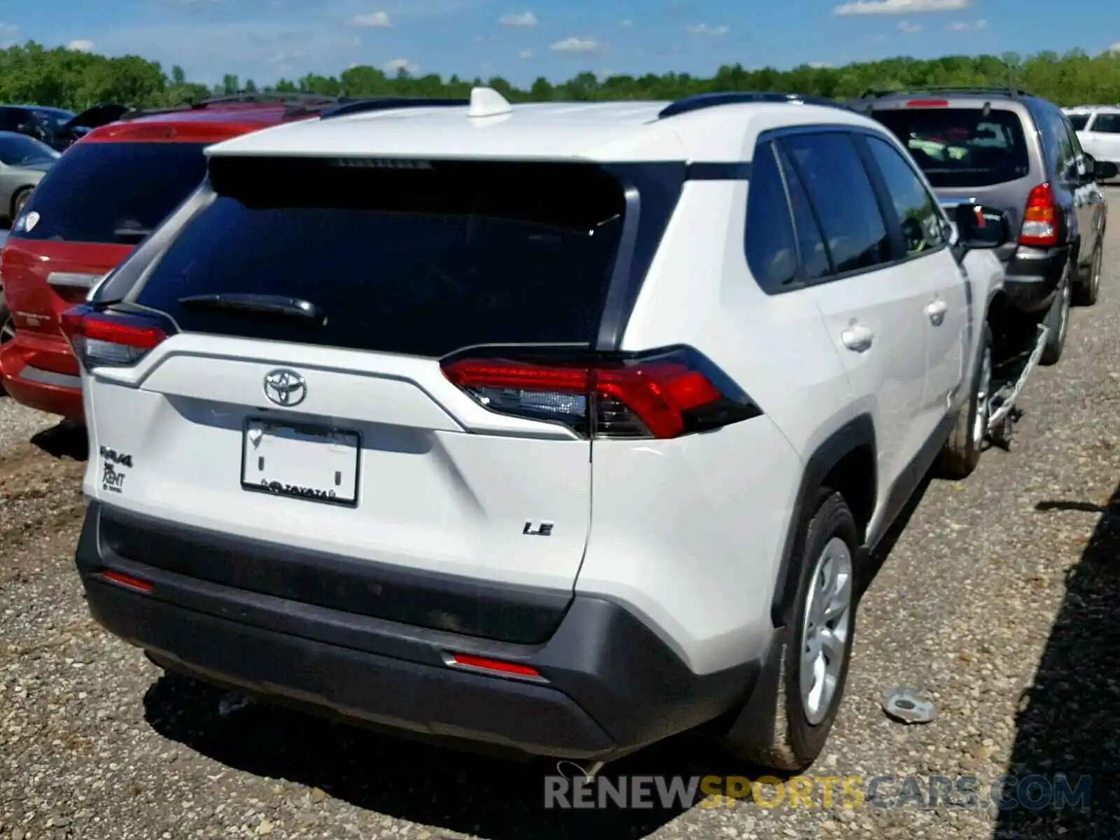 4 Photograph of a damaged car JTMH1RFV5KJ006932 TOYOTA RAV4 LE 2019