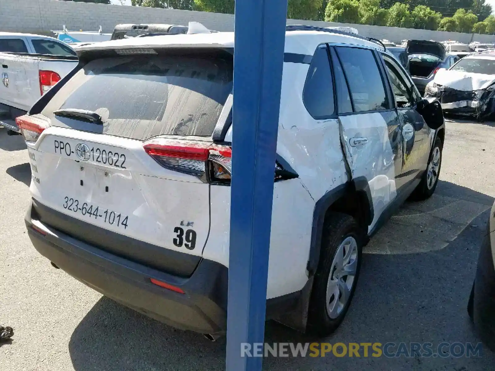 4 Photograph of a damaged car JTMH1RFV9KD502234 TOYOTA RAV4 LE 2019