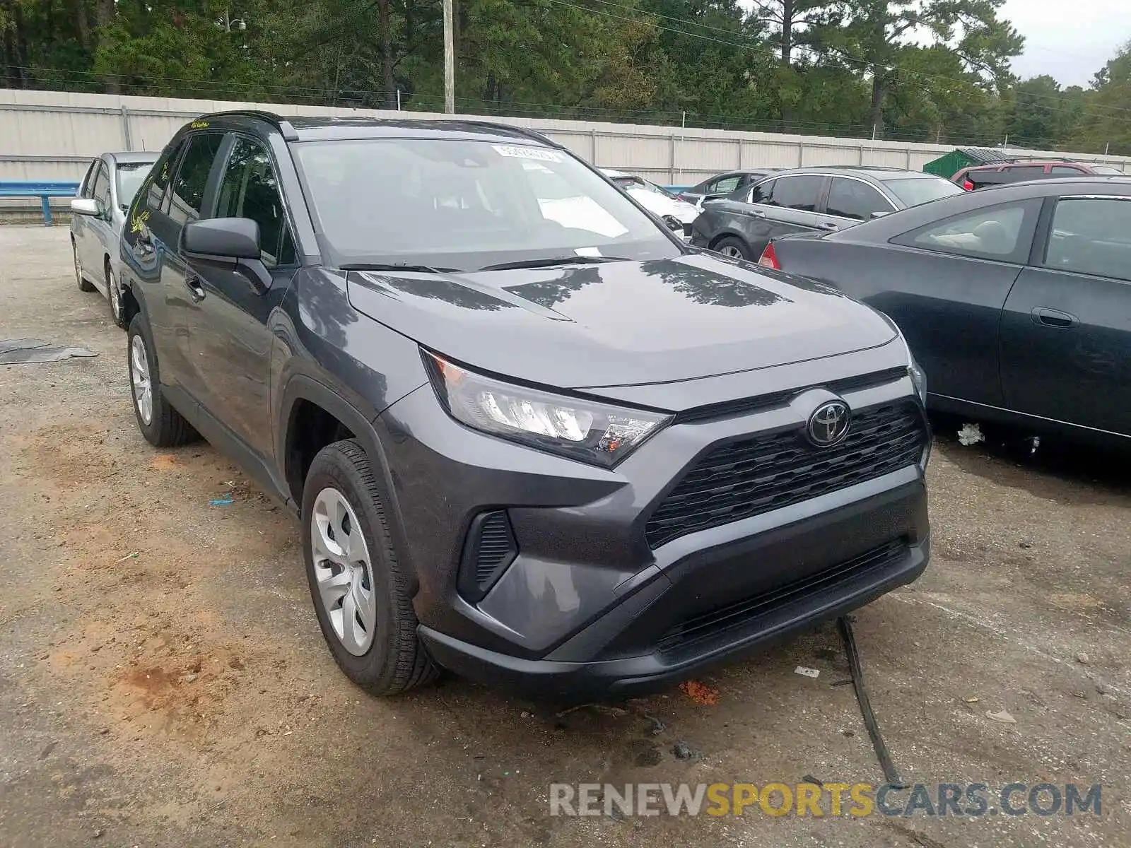 1 Photograph of a damaged car JTMH1RFV9KD507725 TOYOTA RAV4 LE 2019