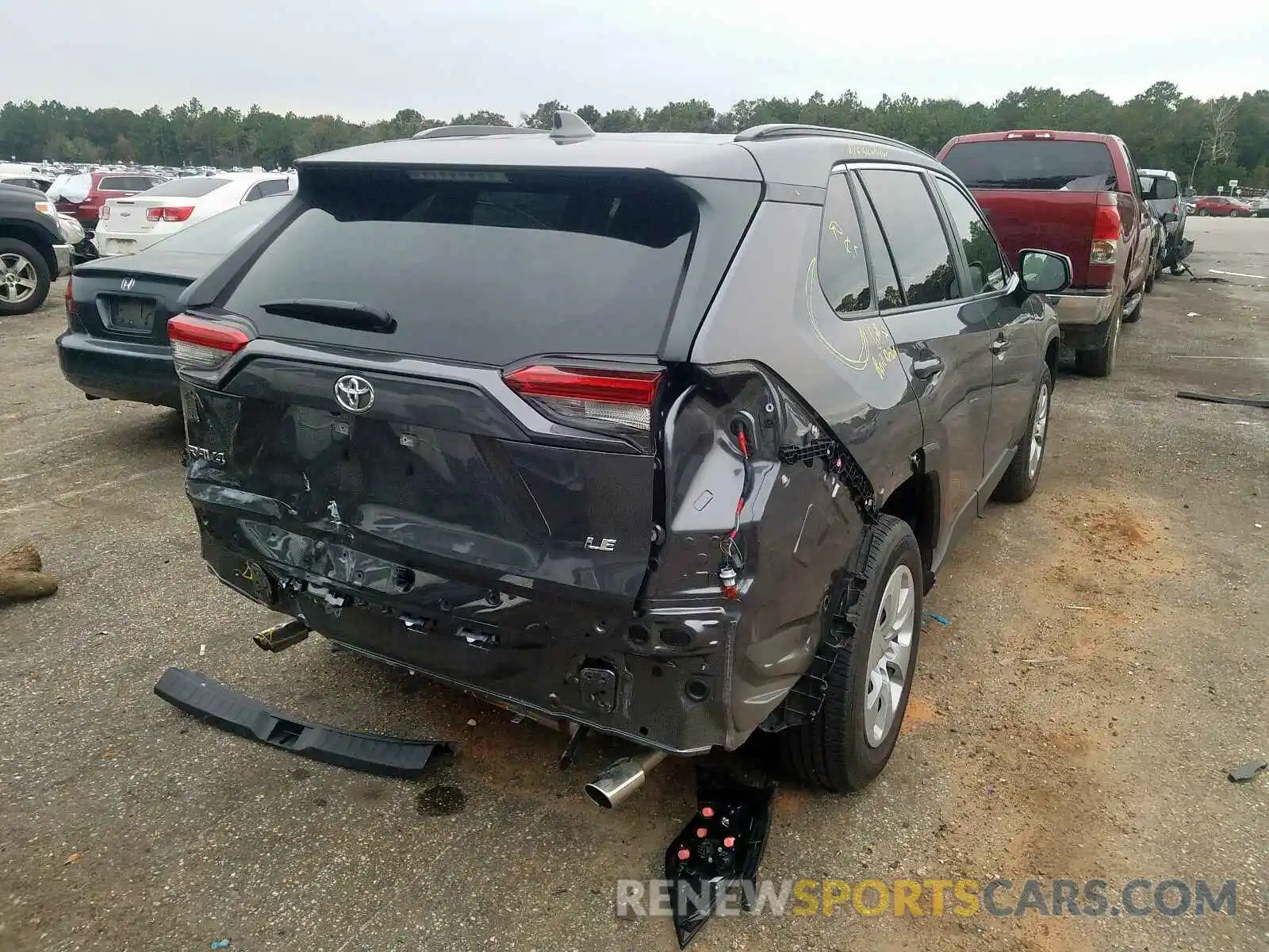 4 Photograph of a damaged car JTMH1RFV9KD507725 TOYOTA RAV4 LE 2019