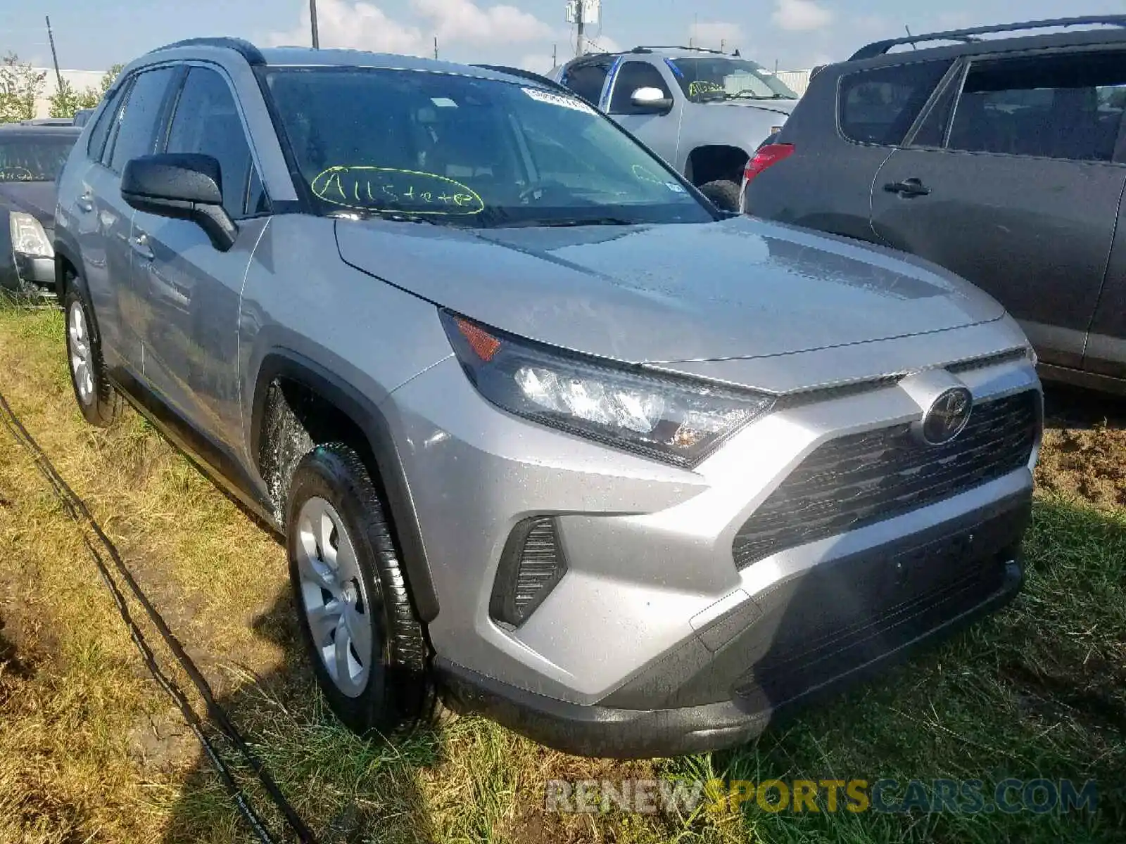 1 Photograph of a damaged car JTMH1RFV9KJ002852 TOYOTA RAV4 LE 2019