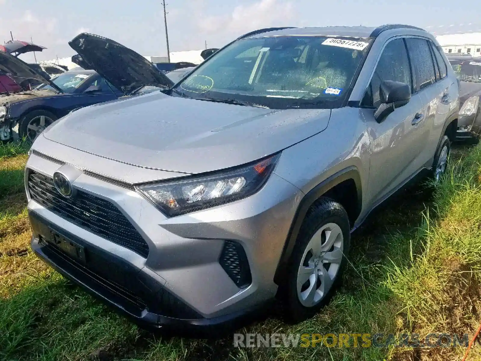 2 Photograph of a damaged car JTMH1RFV9KJ002852 TOYOTA RAV4 LE 2019