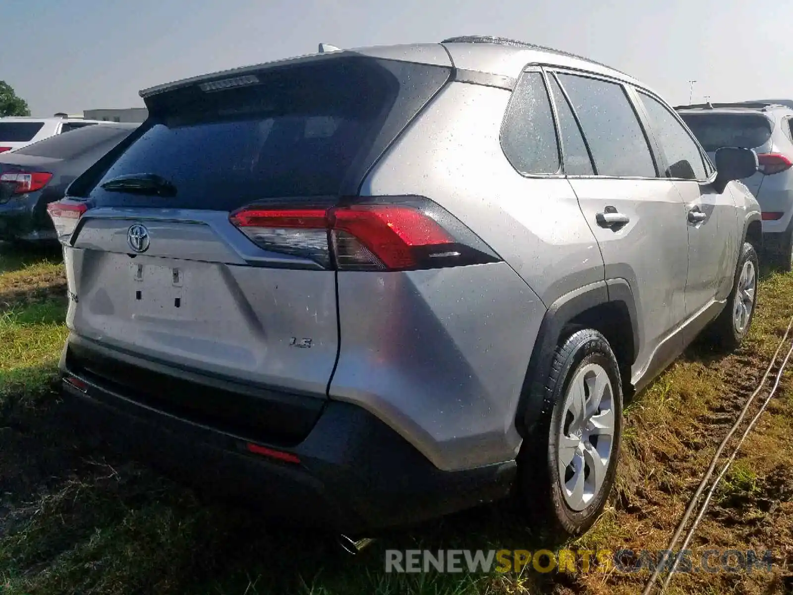 4 Photograph of a damaged car JTMH1RFV9KJ002852 TOYOTA RAV4 LE 2019