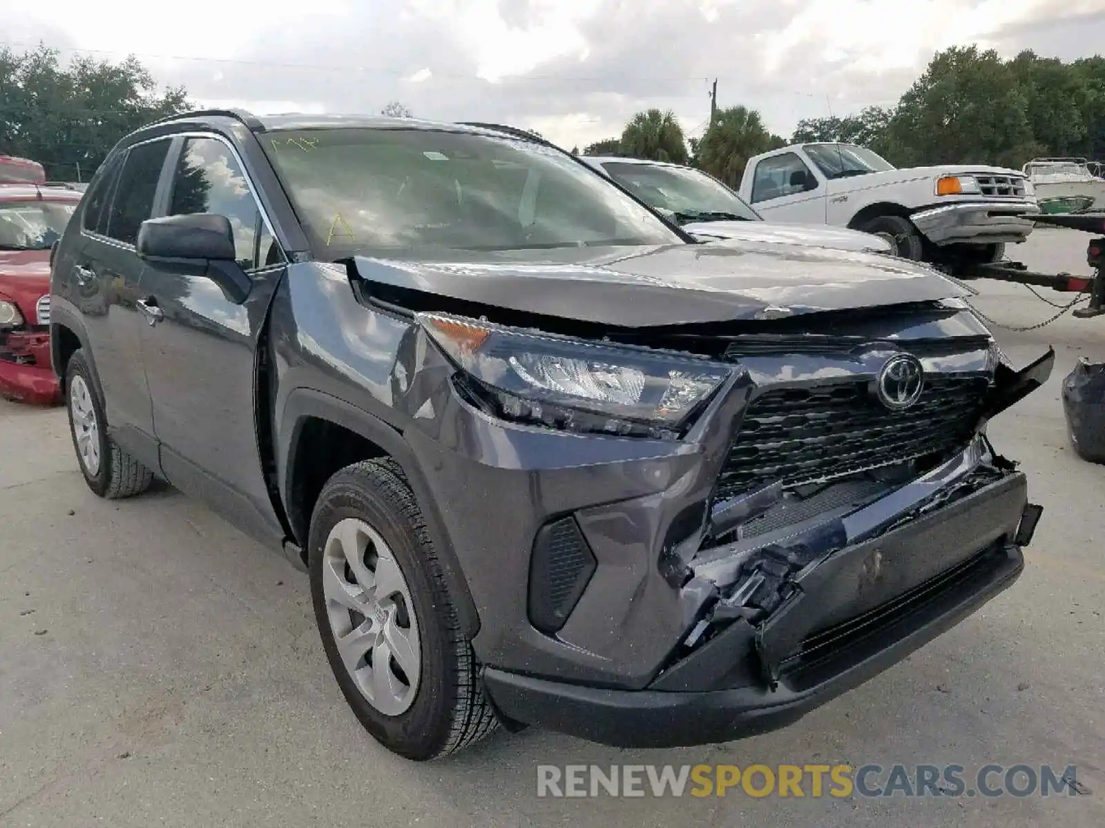 1 Photograph of a damaged car JTMH1RFV9KJ014936 TOYOTA RAV4 LE 2019