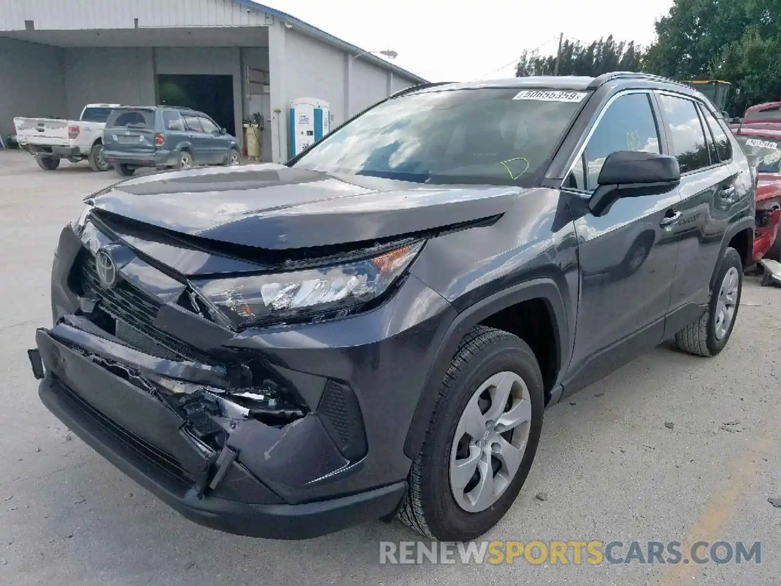 2 Photograph of a damaged car JTMH1RFV9KJ014936 TOYOTA RAV4 LE 2019