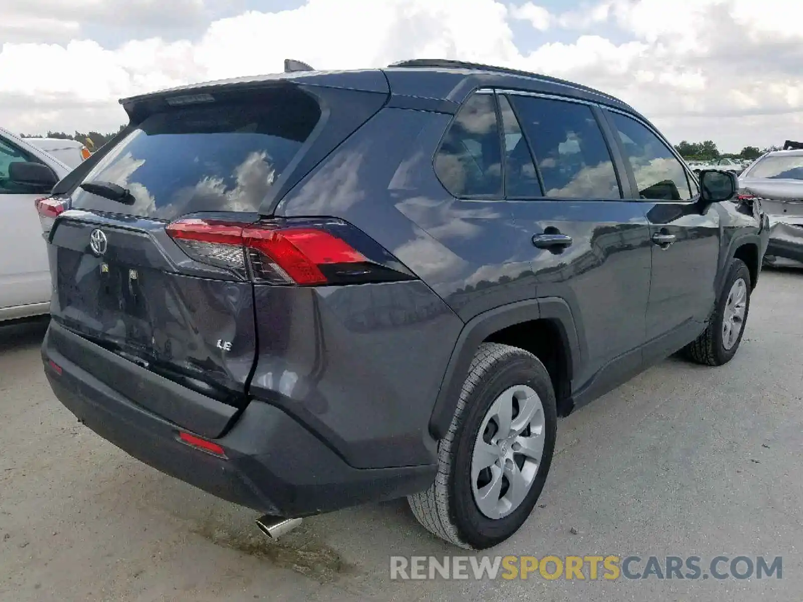 4 Photograph of a damaged car JTMH1RFV9KJ014936 TOYOTA RAV4 LE 2019