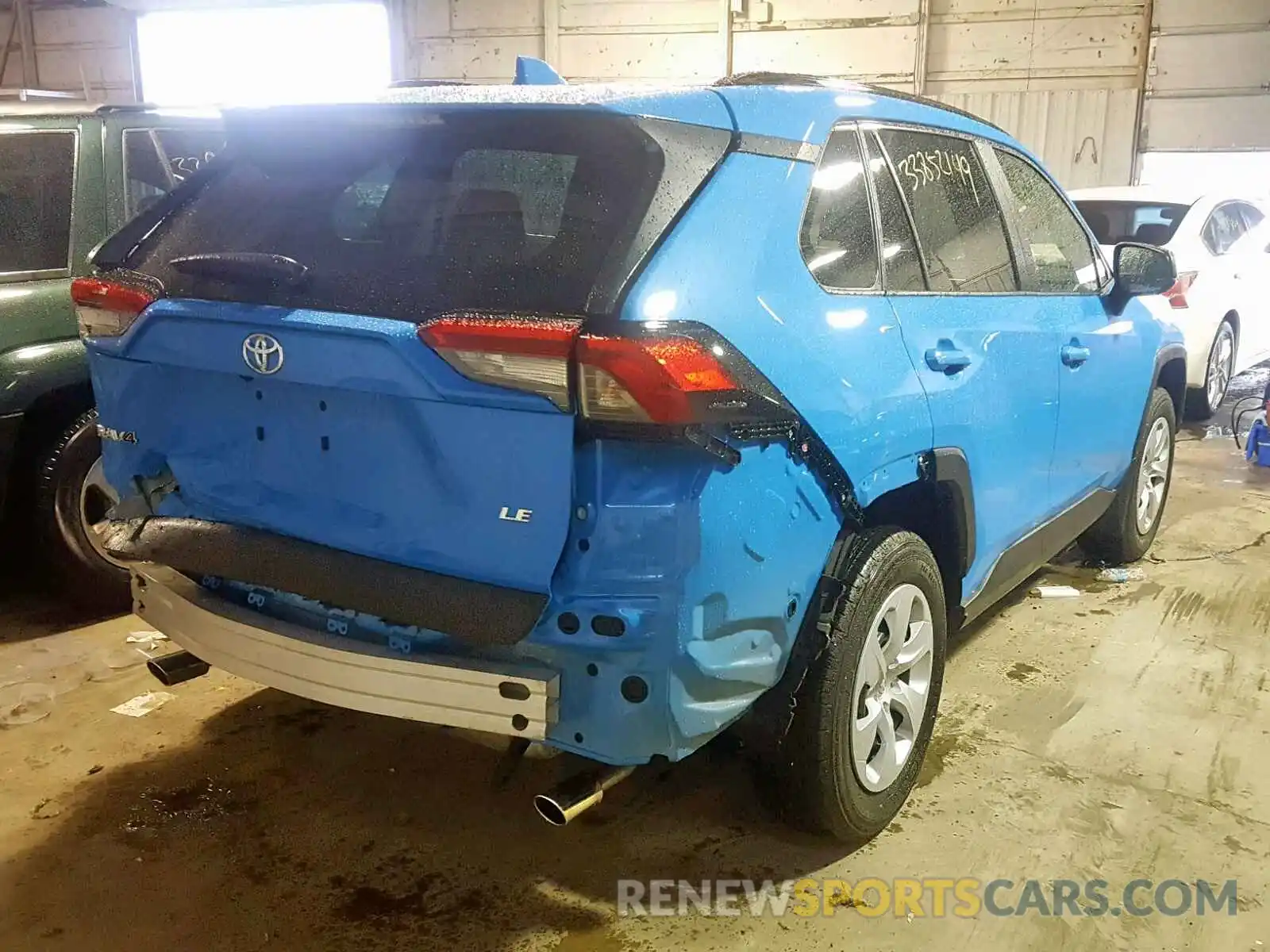 4 Photograph of a damaged car JTMH1RFVXKD005807 TOYOTA RAV4 LE 2019