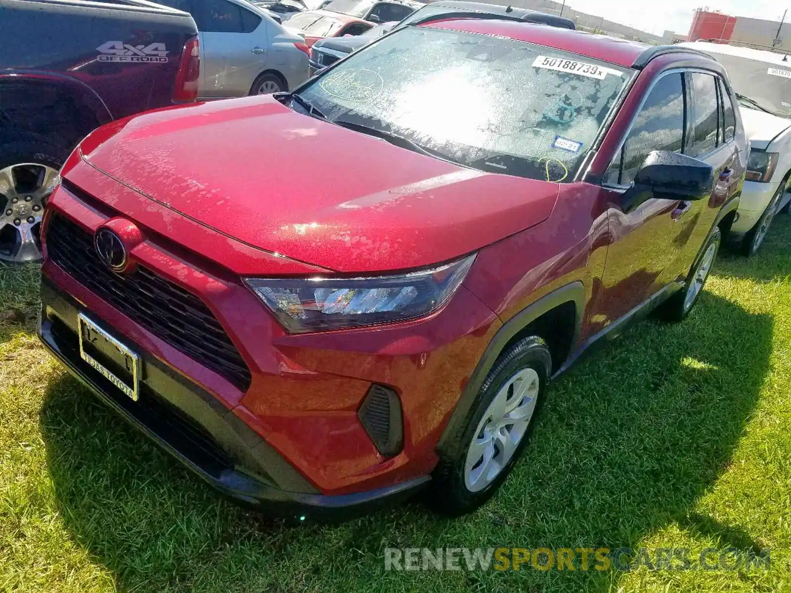 2 Photograph of a damaged car JTMH1RFVXKD010702 TOYOTA RAV4 LE 2019