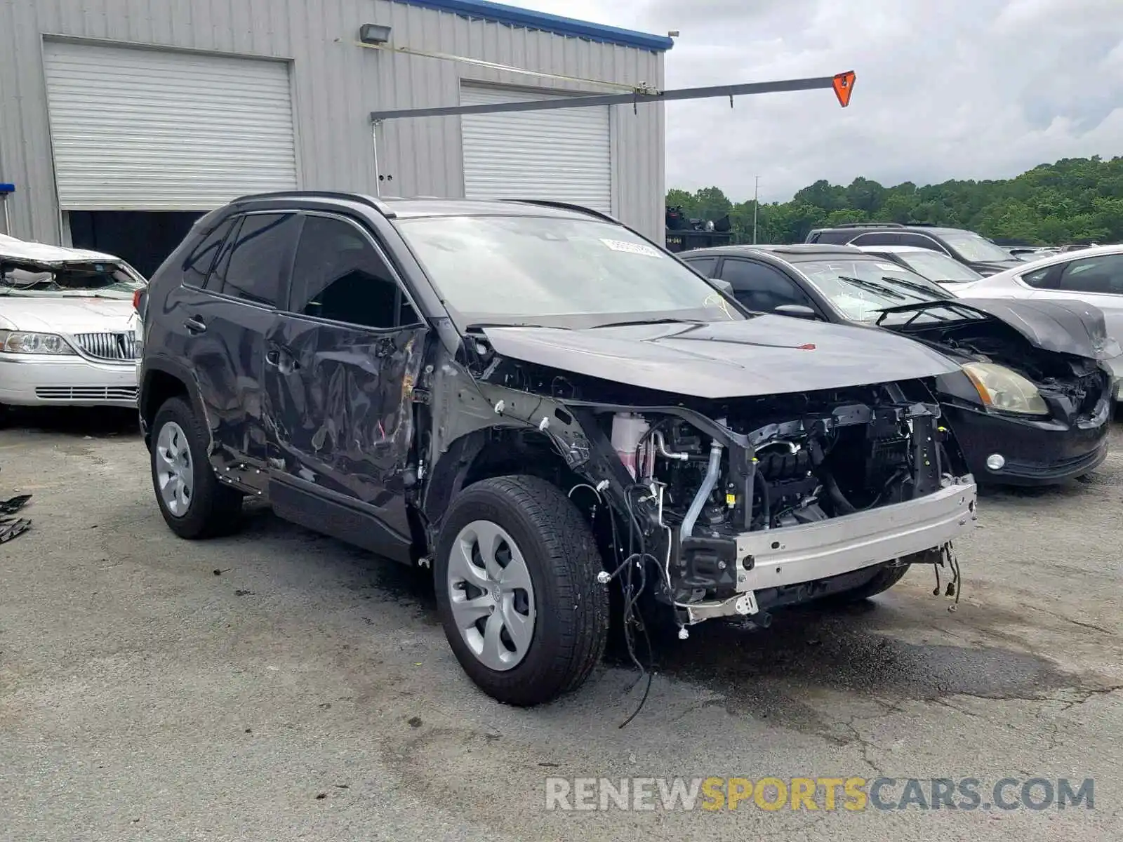 1 Photograph of a damaged car JTMH1RFVXKD507734 TOYOTA RAV4 LE 2019