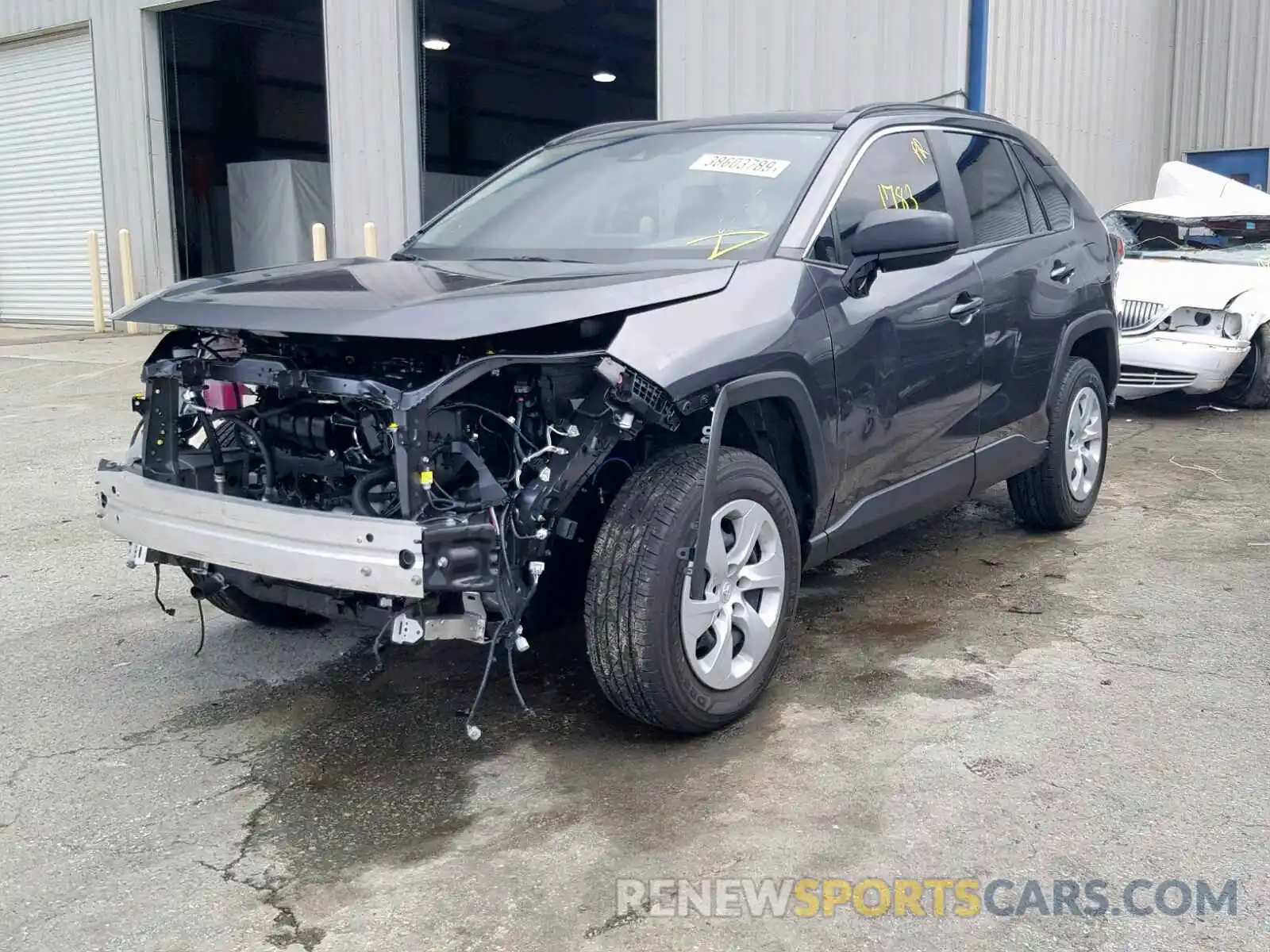 2 Photograph of a damaged car JTMH1RFVXKD507734 TOYOTA RAV4 LE 2019