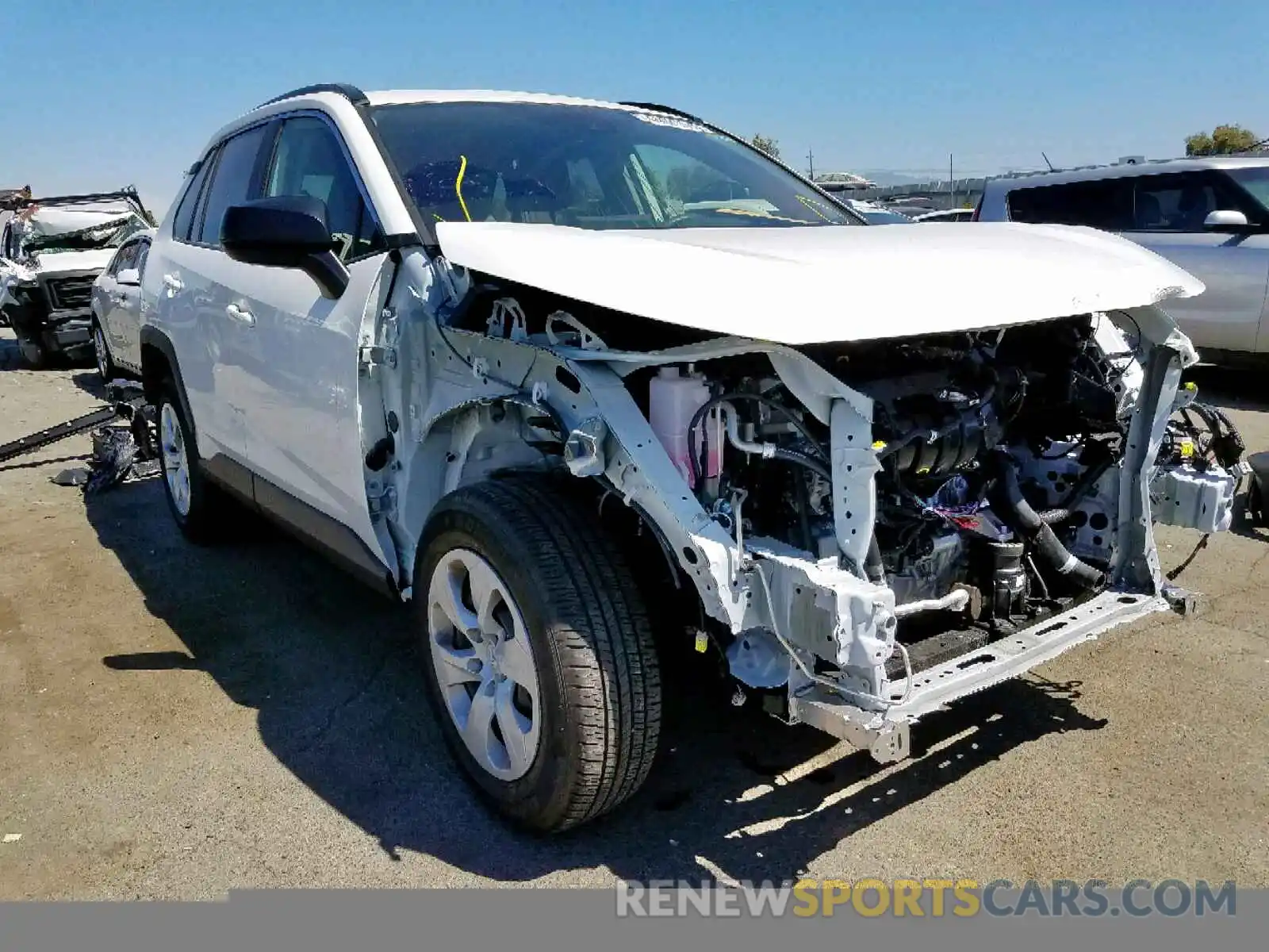 1 Photograph of a damaged car JTMH1RFVXKJ006490 TOYOTA RAV4 LE 2019