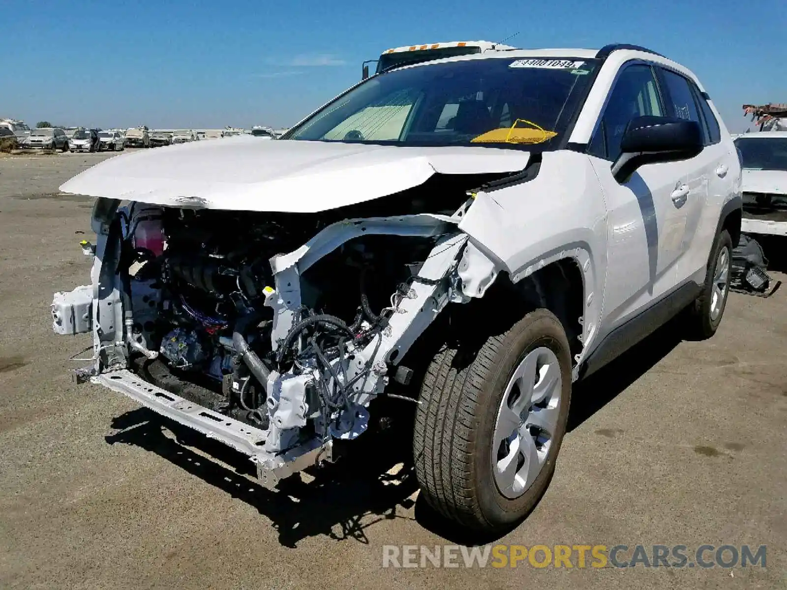 2 Photograph of a damaged car JTMH1RFVXKJ006490 TOYOTA RAV4 LE 2019