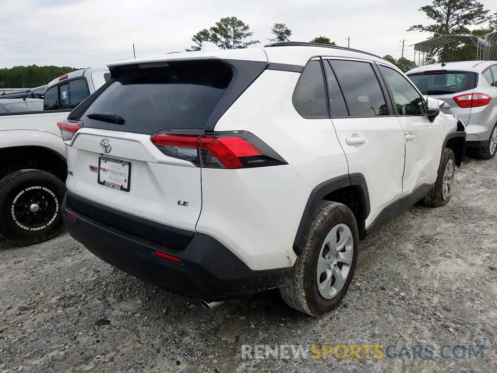 4 Photograph of a damaged car JTMK1RFV0KD028972 TOYOTA RAV4 LE 2019