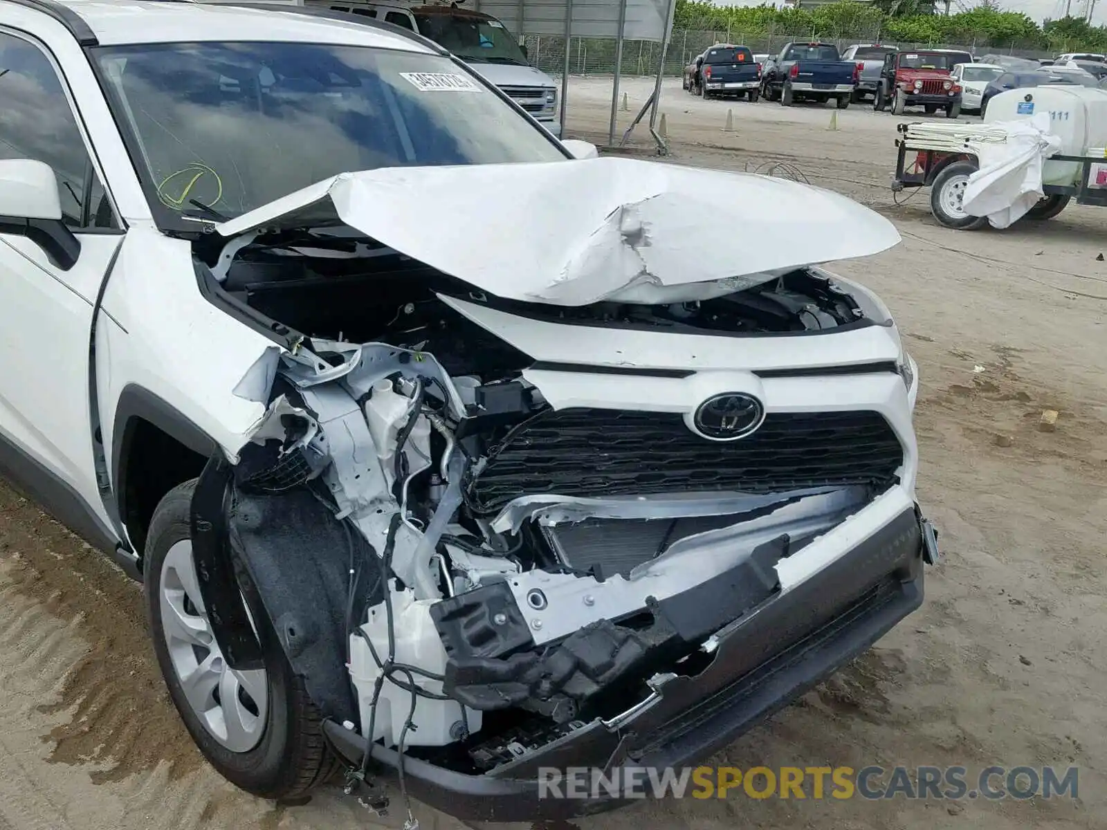9 Фотография поврежденного автомобиля JTMK1RFV9KJ005126 TOYOTA RAV4 LE 2019