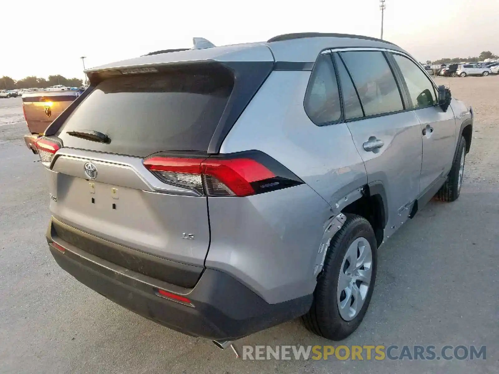 4 Photograph of a damaged car JTMK1RFVXKD023262 TOYOTA RAV4 LE 2019