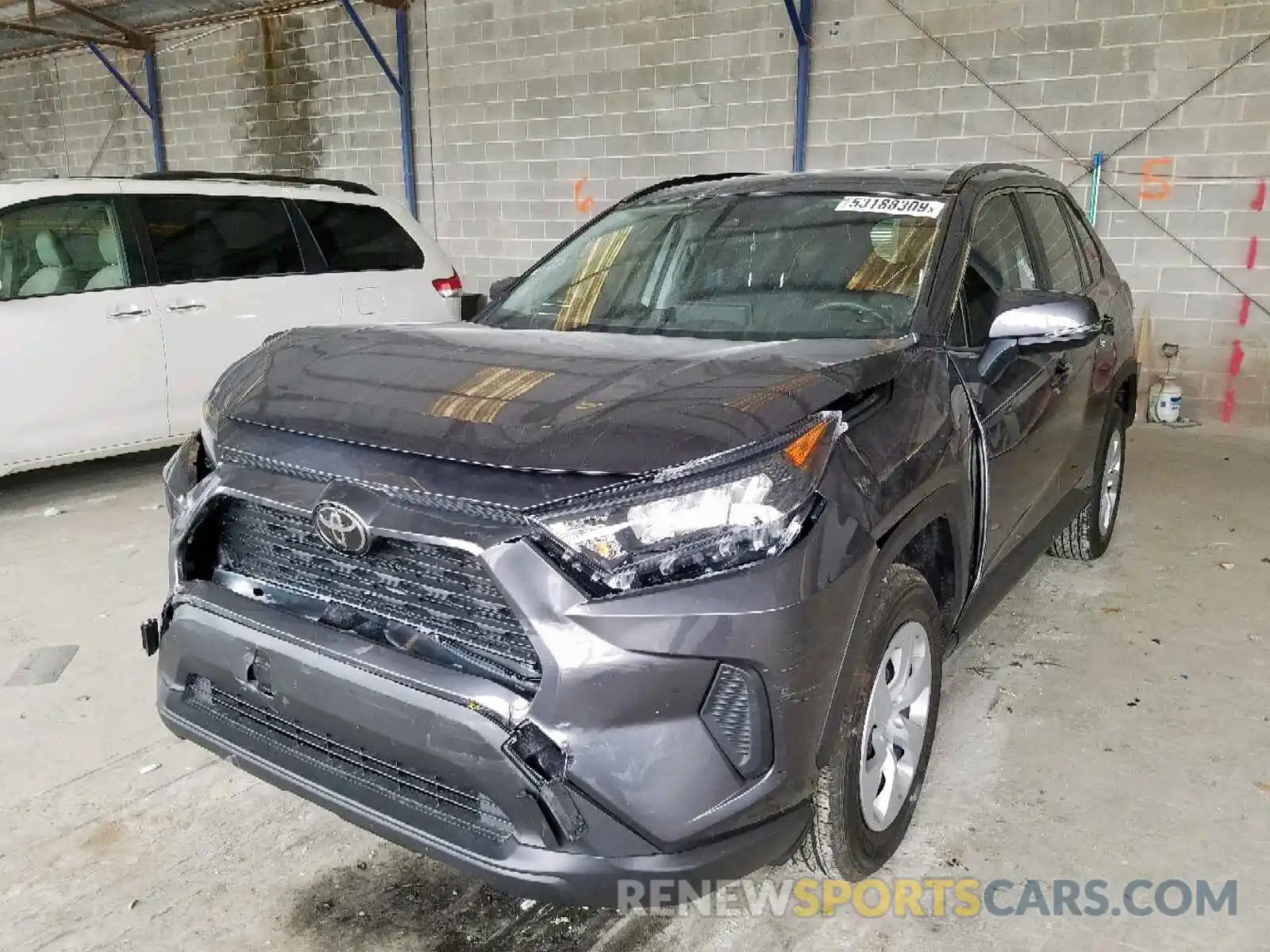 2 Photograph of a damaged car JTMK1RFVXKD034634 TOYOTA RAV4 LE 2019